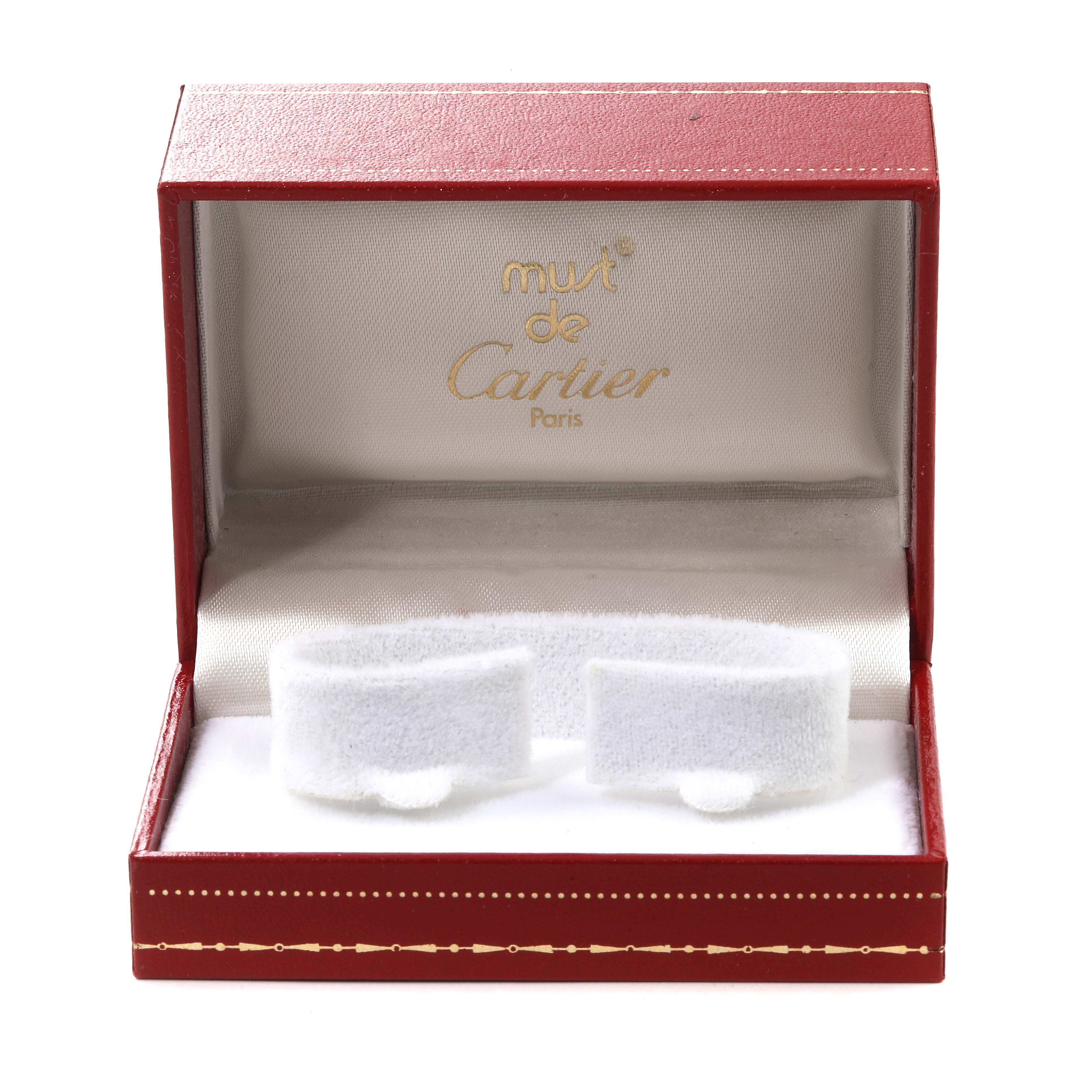This image shows a red Cartier watch box for the Panthere model, viewed from the front, displaying the interior branding.