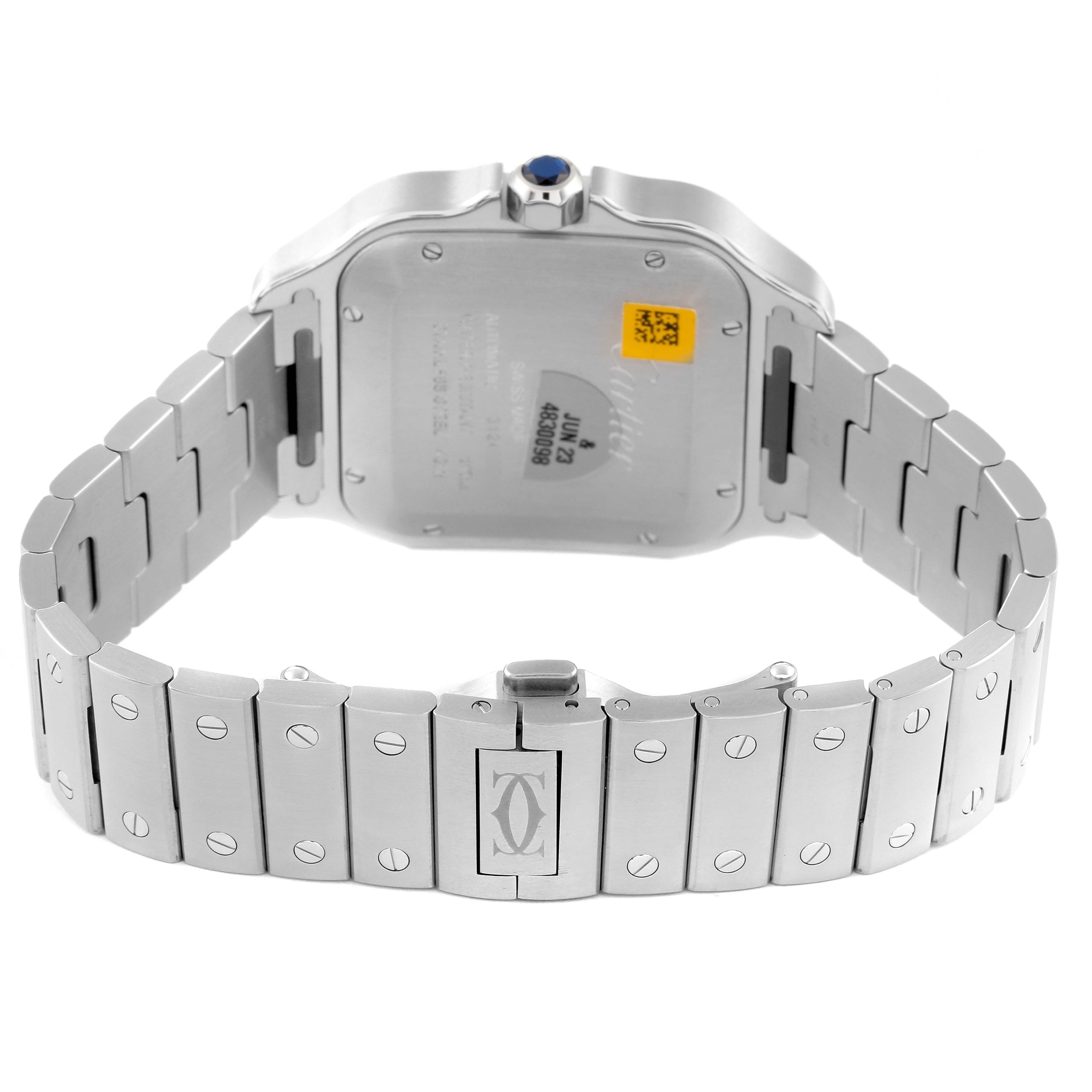 The image shows the back view of a Cartier Santos WSSA0030 Men
s Stainless Steel Blue Dial WSSA0030 Men
s Stainless Steel Blue Dial watch, showcasing its metal bracelet and case back with engraved details.