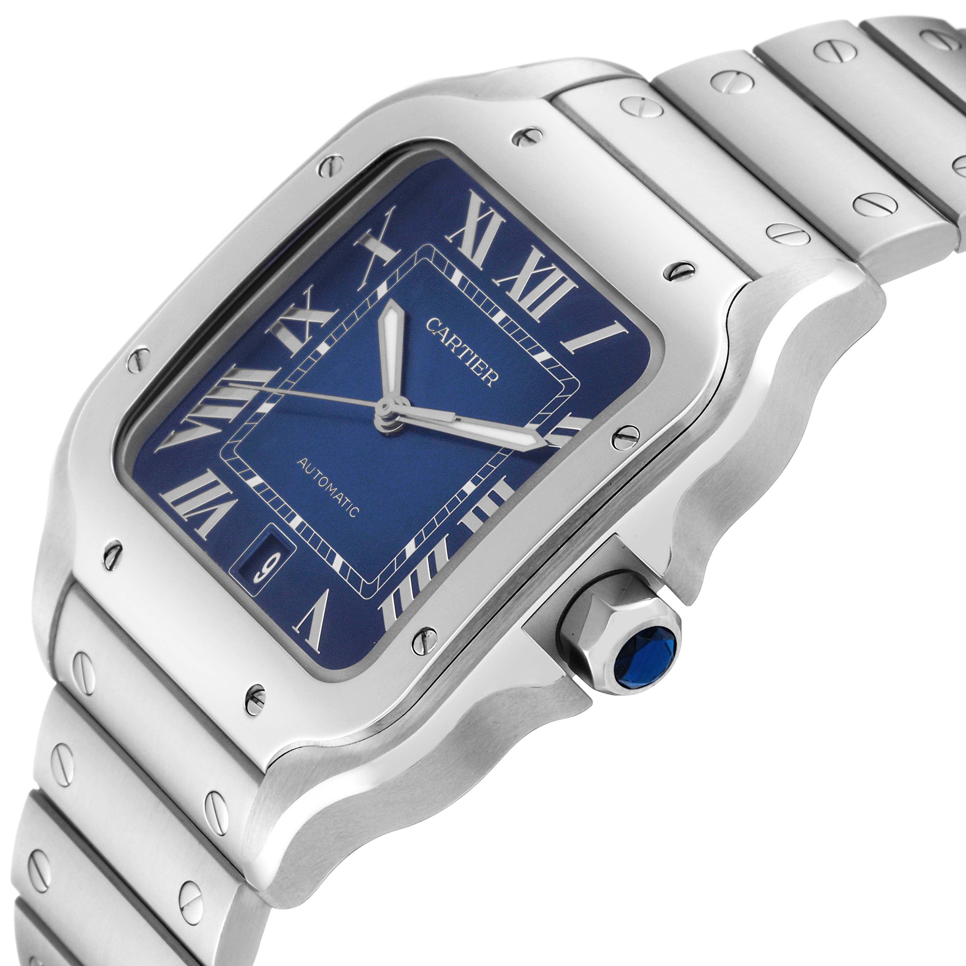 The image shows a close-up angle of the Cartier Santos WSSA0030 Men
s Stainless Steel Blue Dial WSSA0030 Men
s Stainless Steel Blue Dial model watch focusing on its blue dial, bezel, and part of the bracelet.