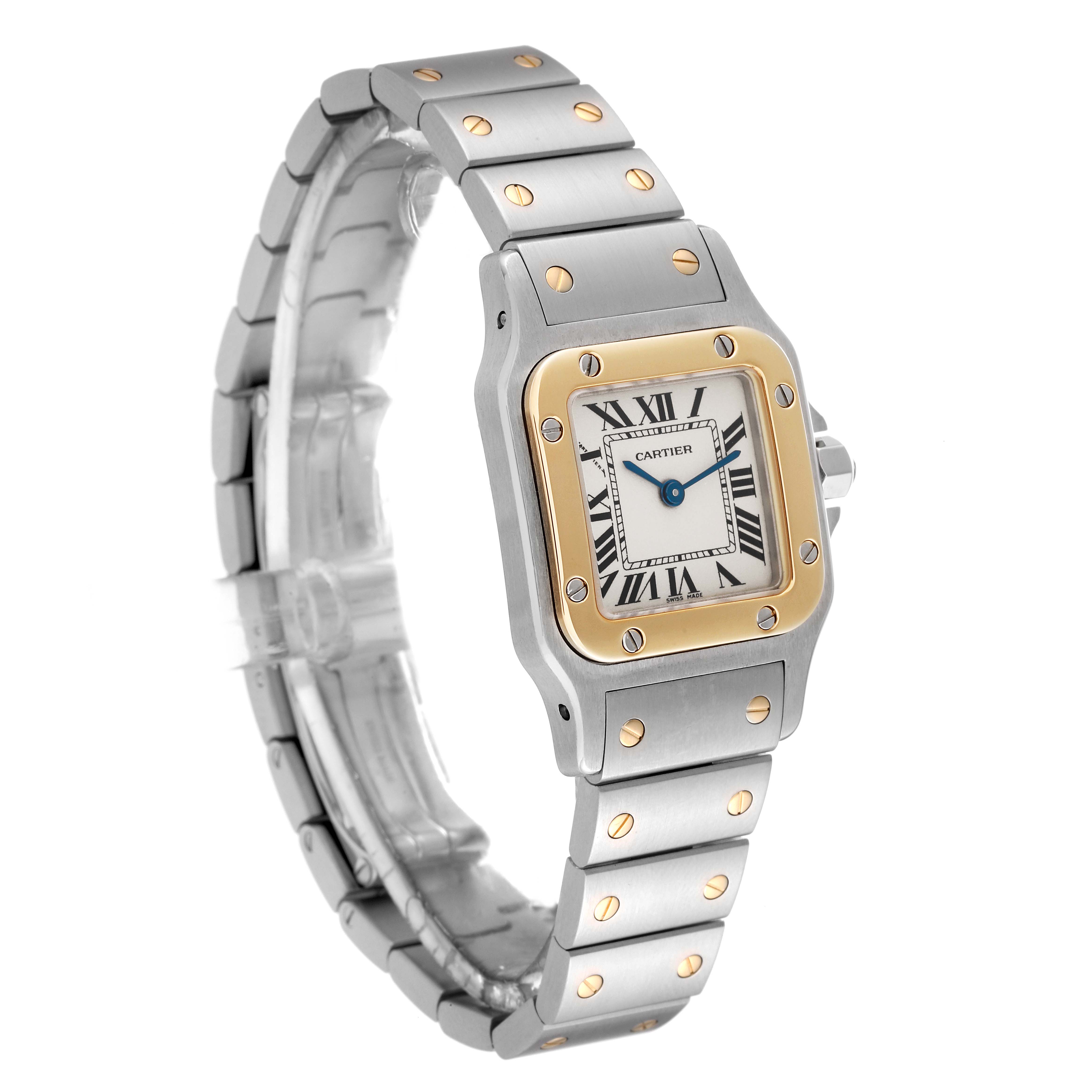 This image shows a Santos de Cartier watch at a three-quarter angle, highlighting its face, bezel, and bracelet.