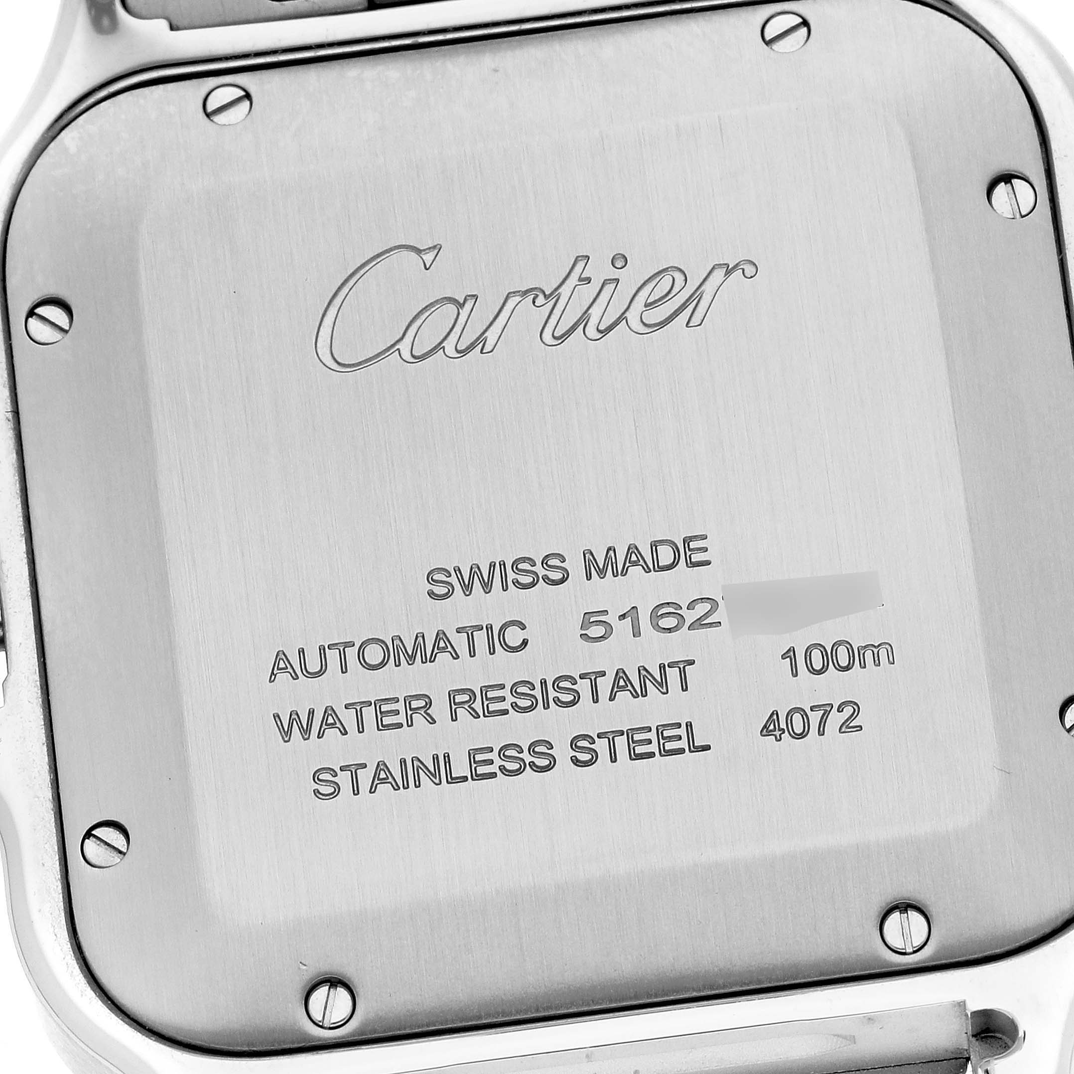 The image shows the back case of a Cartier Santos WSSA0018 Men
s Stainless Steel Silver Dial WSSA0018 Men
s Stainless Steel Silver Dial watch, displaying engravings of technical specifications.