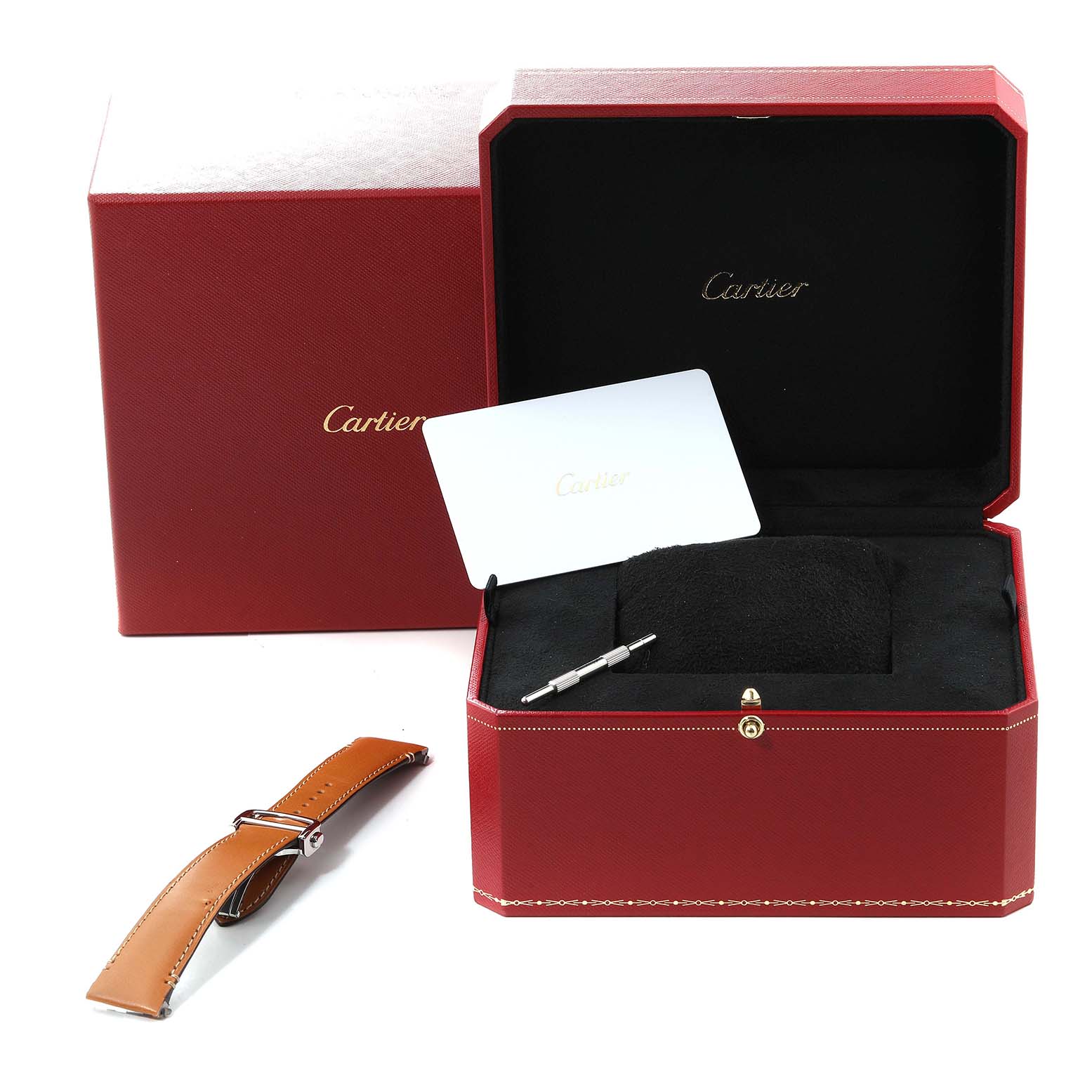 The image shows an open Cartier Santos WSSA0018 Men
s Stainless Steel Silver Dial WSSA0018 Men
s Stainless Steel Silver Dial watch box with a leather strap, screwdriver tool, and a card inside.