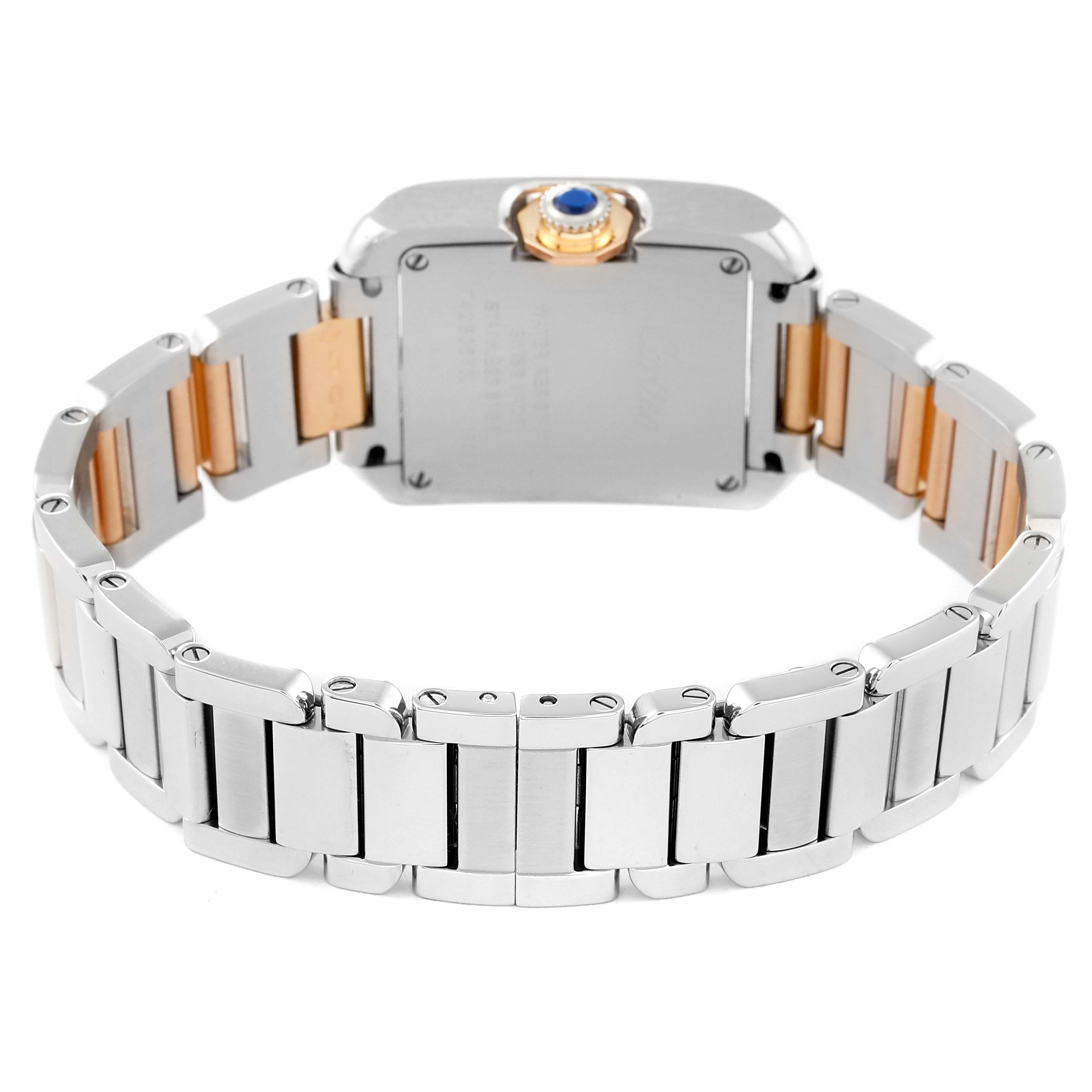 The image shows the back view of a Cartier Tank Anglaise WT100024 Women's Steel and Gold (two tone) Silver Dial WT100024 Women's Steel and Gold (two tone) Silver Dial watch, highlighting the stainless steel and gold bracelet and the case back.