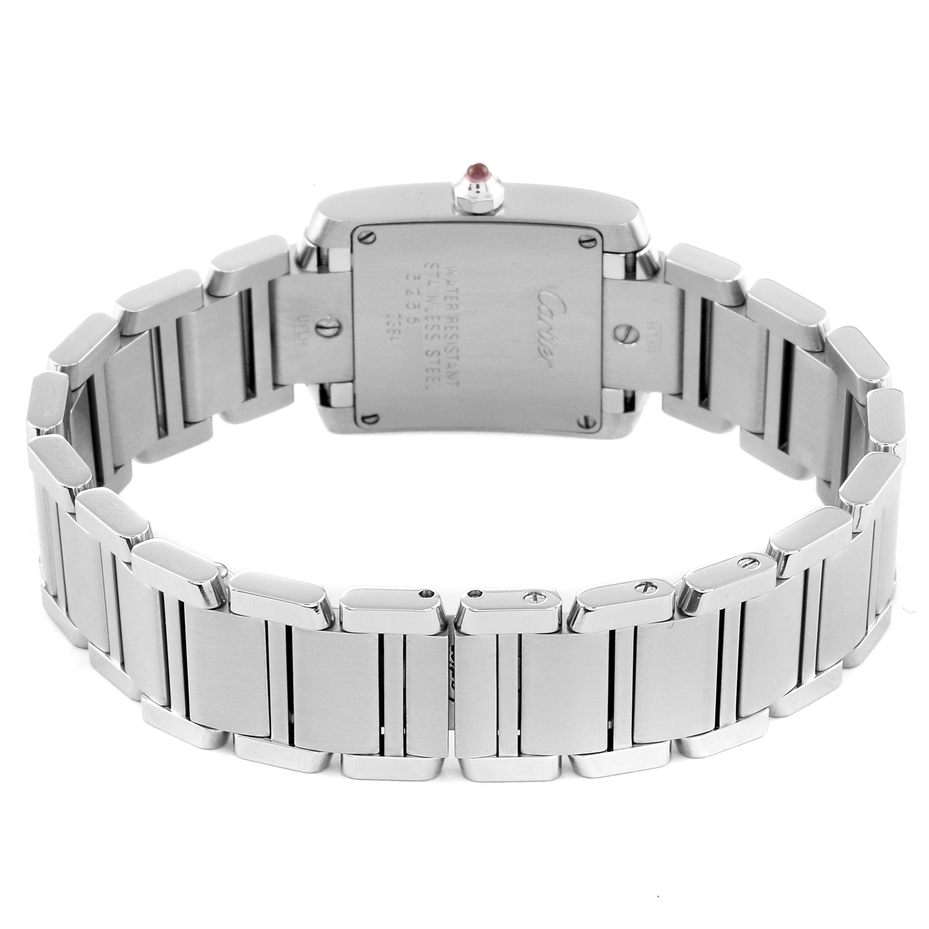 This image shows the backside of the Cartier Tank Française watch, highlighting the stainless steel bracelet and case back.
