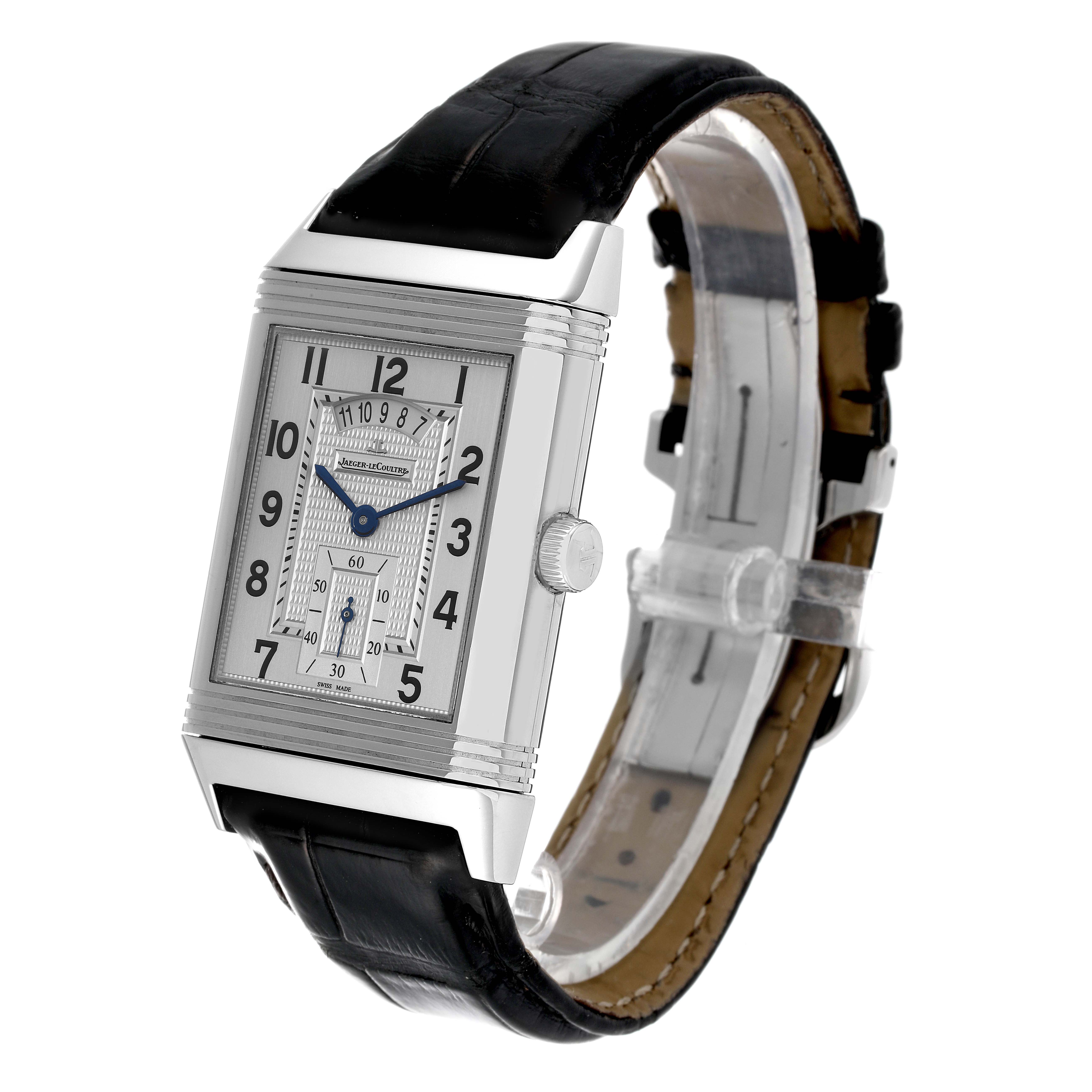 This image shows a Jaeger LeCoultre Reverso Q3748421 Men's Stainless Steel Silver Dial Q3748421 Men's Stainless Steel Silver Dial model watch at a slight angle, highlighting its rectangular face, black strap, and side crown.