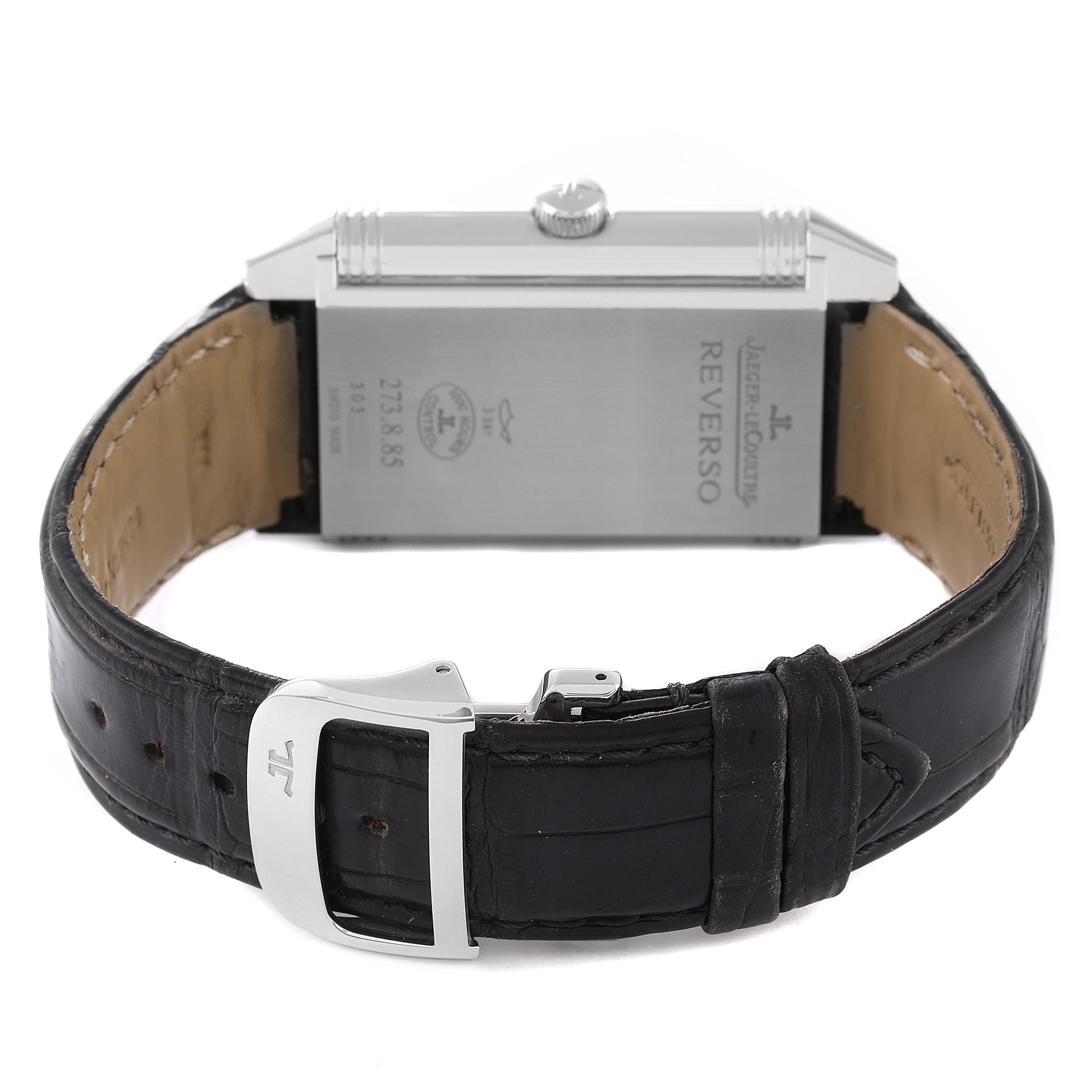 The image shows the back and side view of the Jaeger LeCoultre Reverso Q3748421 Men's Stainless Steel Silver Dial Q3748421 Men's Stainless Steel Silver Dial watch with a black leather strap and clasp.