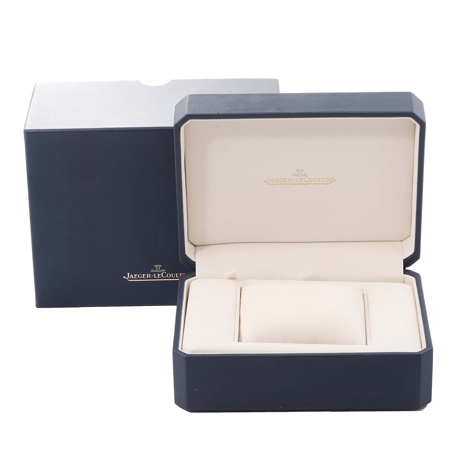 This image shows the opened presentation box for a Jaeger-LeCoultre Reverso watch, with the inner cushion and outer box visible.