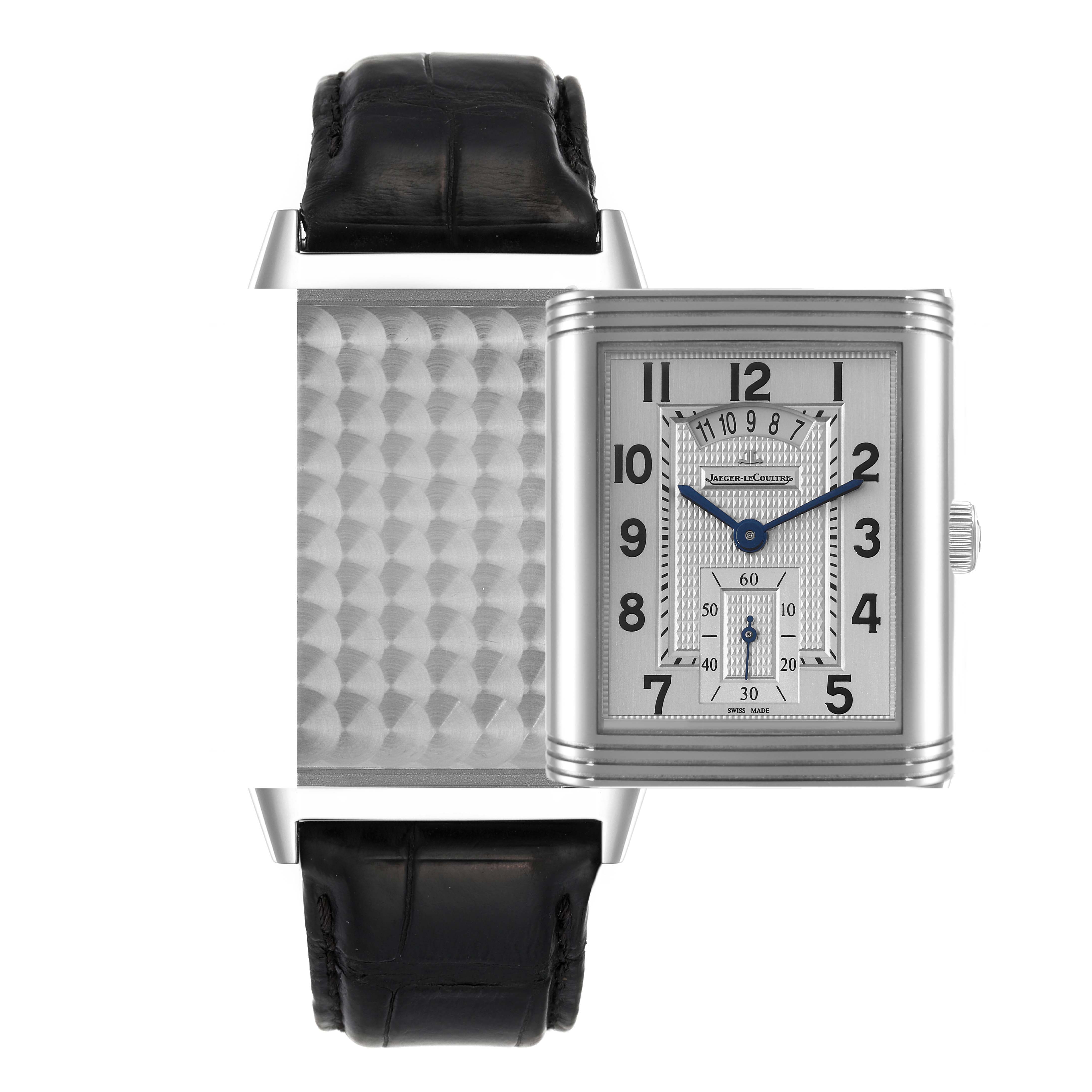 The image shows the Jaeger LeCoultre Reverso Q3748421 Men's Stainless Steel Silver Dial Q3748421 Men's Stainless Steel Silver Dial watch in a front view, highlighting both its patterned flip side and elegant face with blue hands.