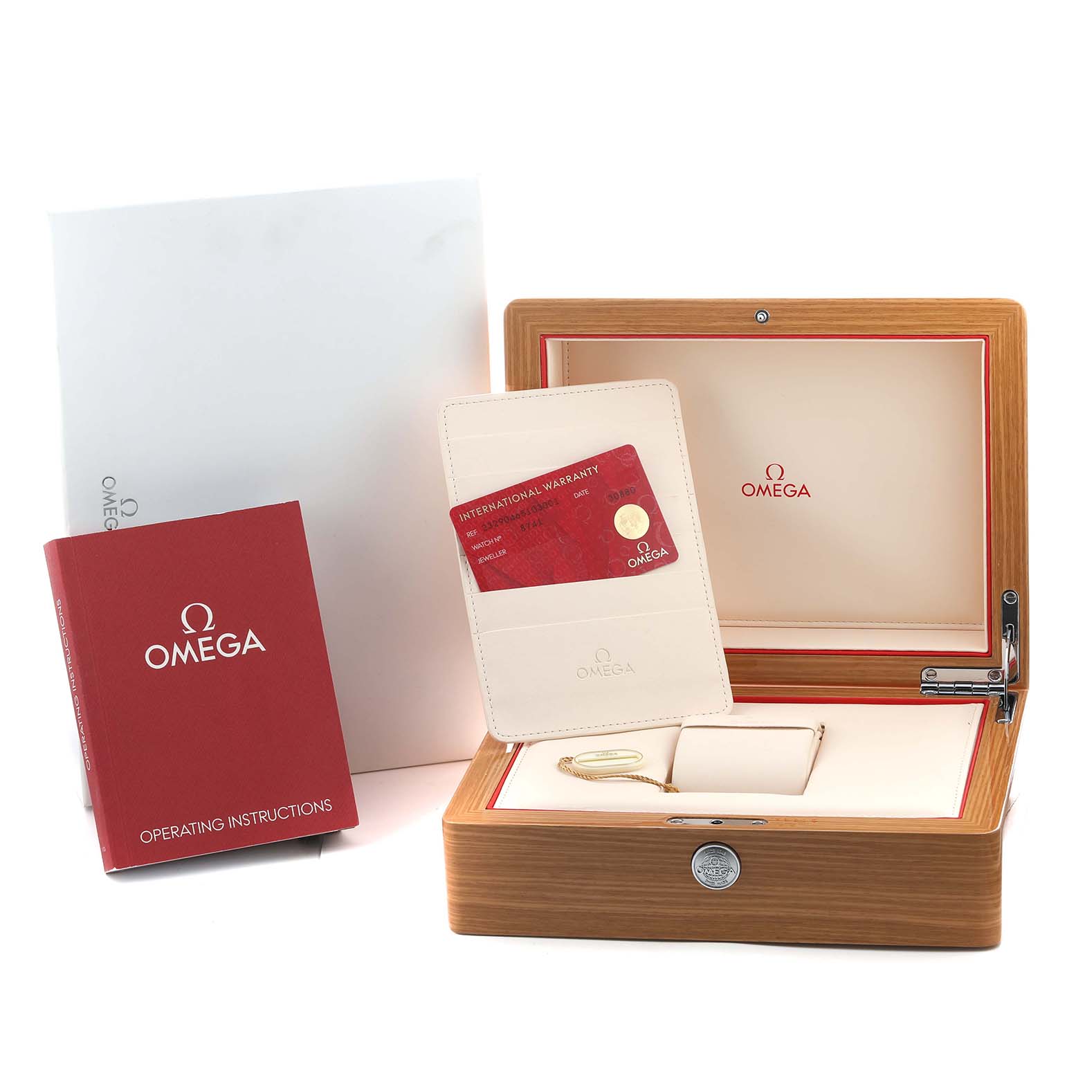 The image shows an Omega Planet Ocean 232.90.46.51.03.001 Men's Titanium Blue Dial watch box, warranty card, and instruction manual arranged neatly.