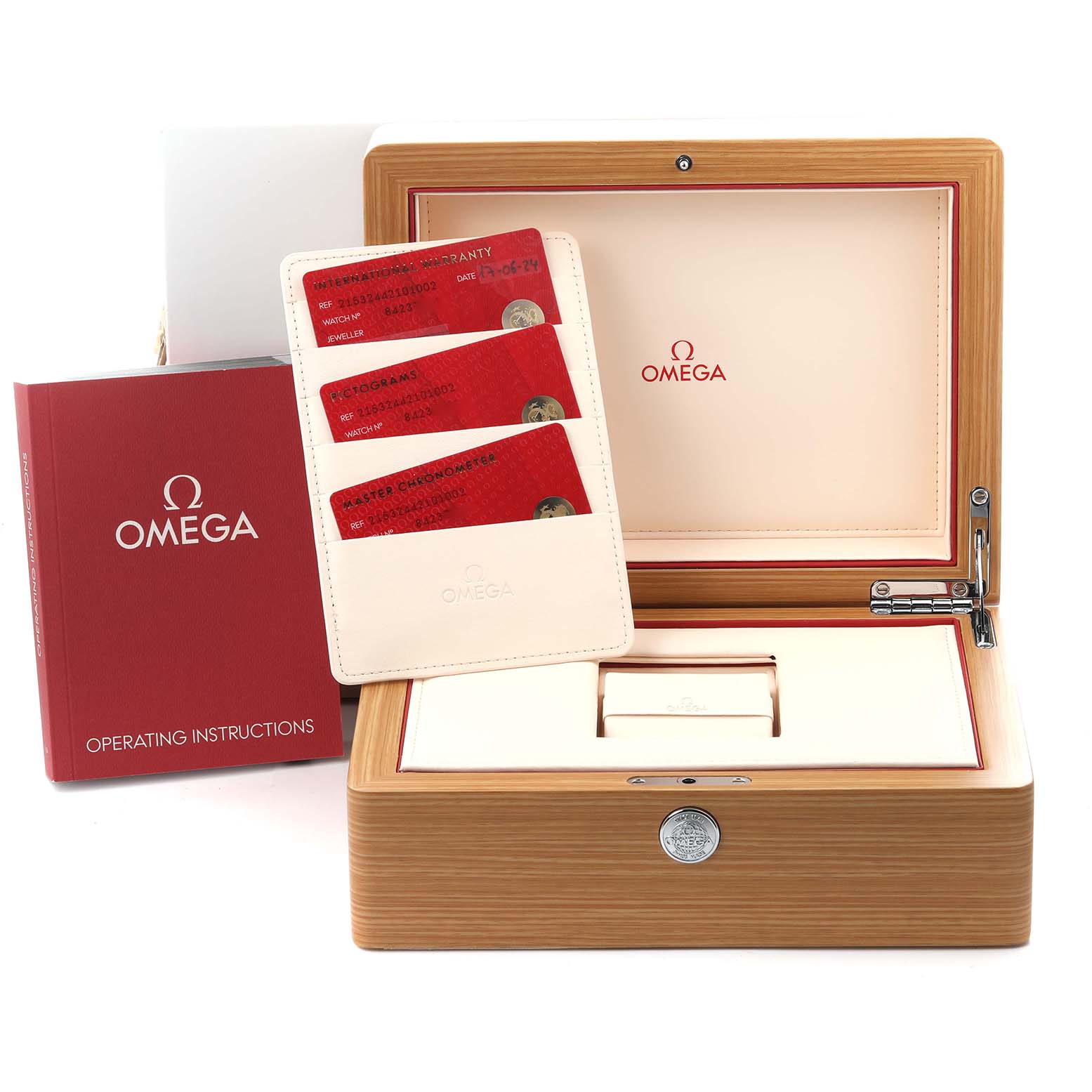 The image shows the Omega Planet Ocean 215.32.44.21.06.001 Men's Stainless Steel Grey Dial 215.32.44.21.06.001 Men's Stainless Steel Grey Dial box, instruction book, and warranty cards, viewed from the front.