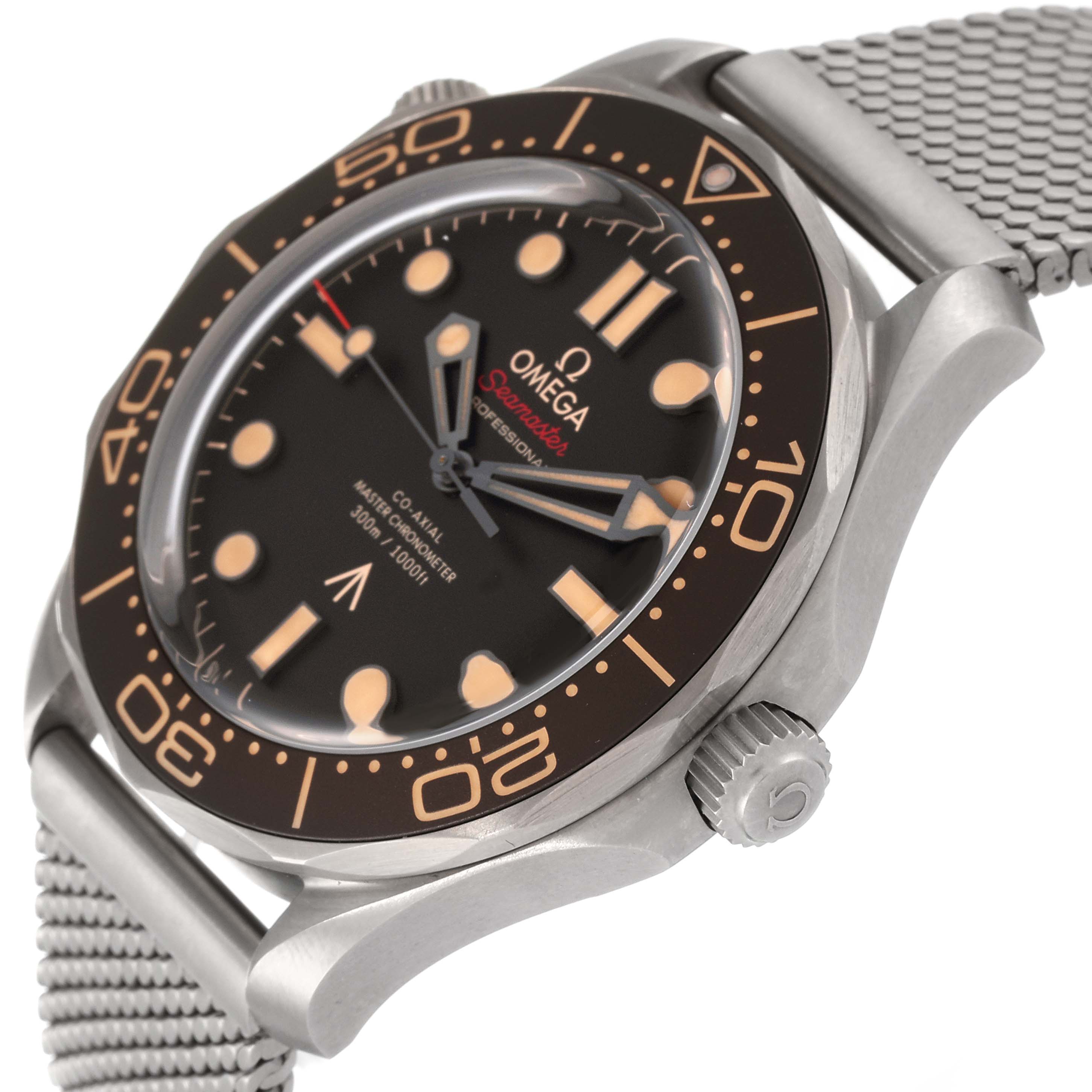 The Omega Seamaster 210.90.42.20.01.001 Men's Titanium Brown Dial 210.90.42.20.01.001 Men's Titanium Brown Dial watch is shown at an angle displaying the face, bezel, crown, and part of the mesh bracelet.