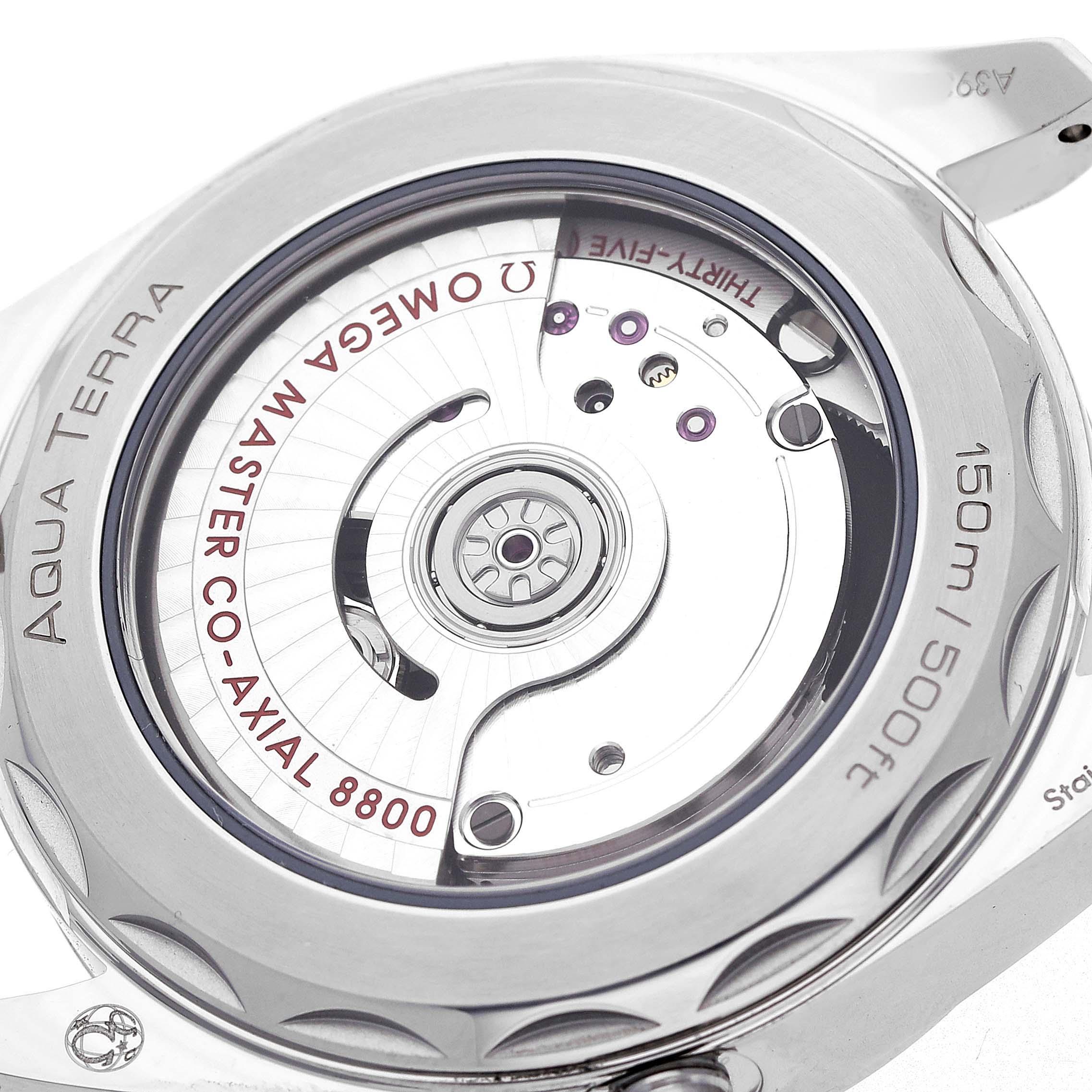 The image shows the back view of the Omega Aqua Terra 220.10.38.20.12.001 Men's Stainless Steel Orange Dial, highlighting the Master Co-Axial 8800 movement and water resistance markings.