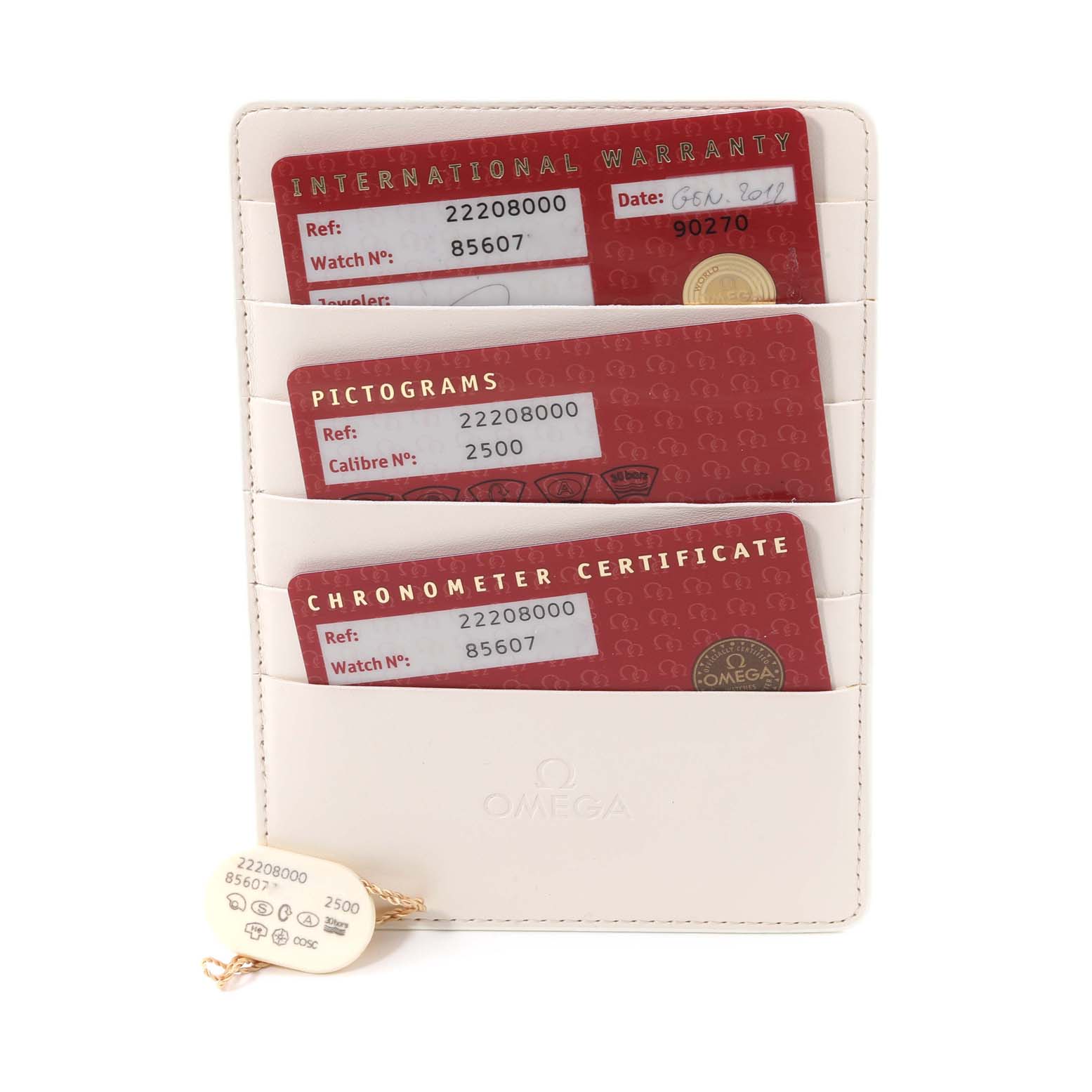 The image shows the warranty cards and tags for the Omega Seamaster 2220.80.00 Men
s Stainless Steel Blue Dial 2220.80.00 Men
s Stainless Steel Blue Dial model.