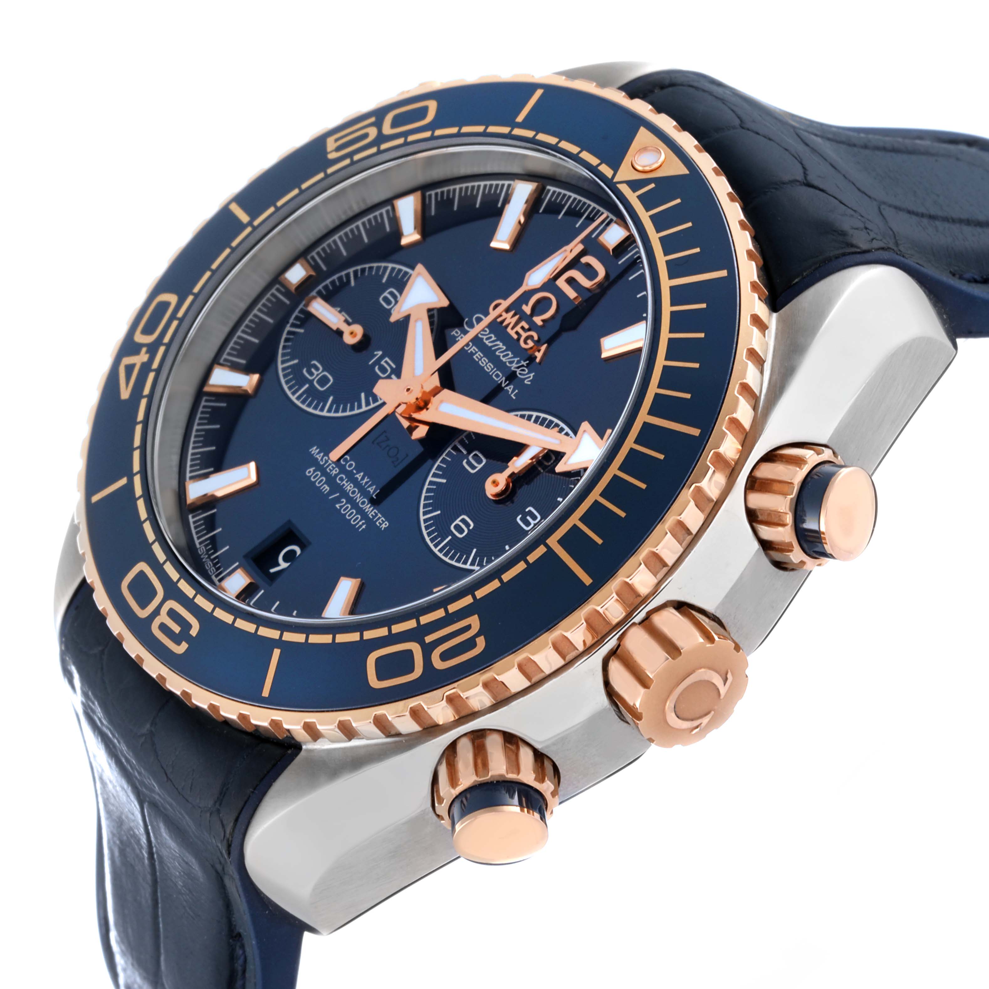 The image shows a close-up, side-angle view of an Omega Planet Ocean 215.23.46.51.03.001 Men's Steel and Gold (two tone) Blue Dial 215.23.46.51.03.001 Men's Steel and Gold (two tone) Blue Dial watch, highlighting the bezel, crown, and pushers.