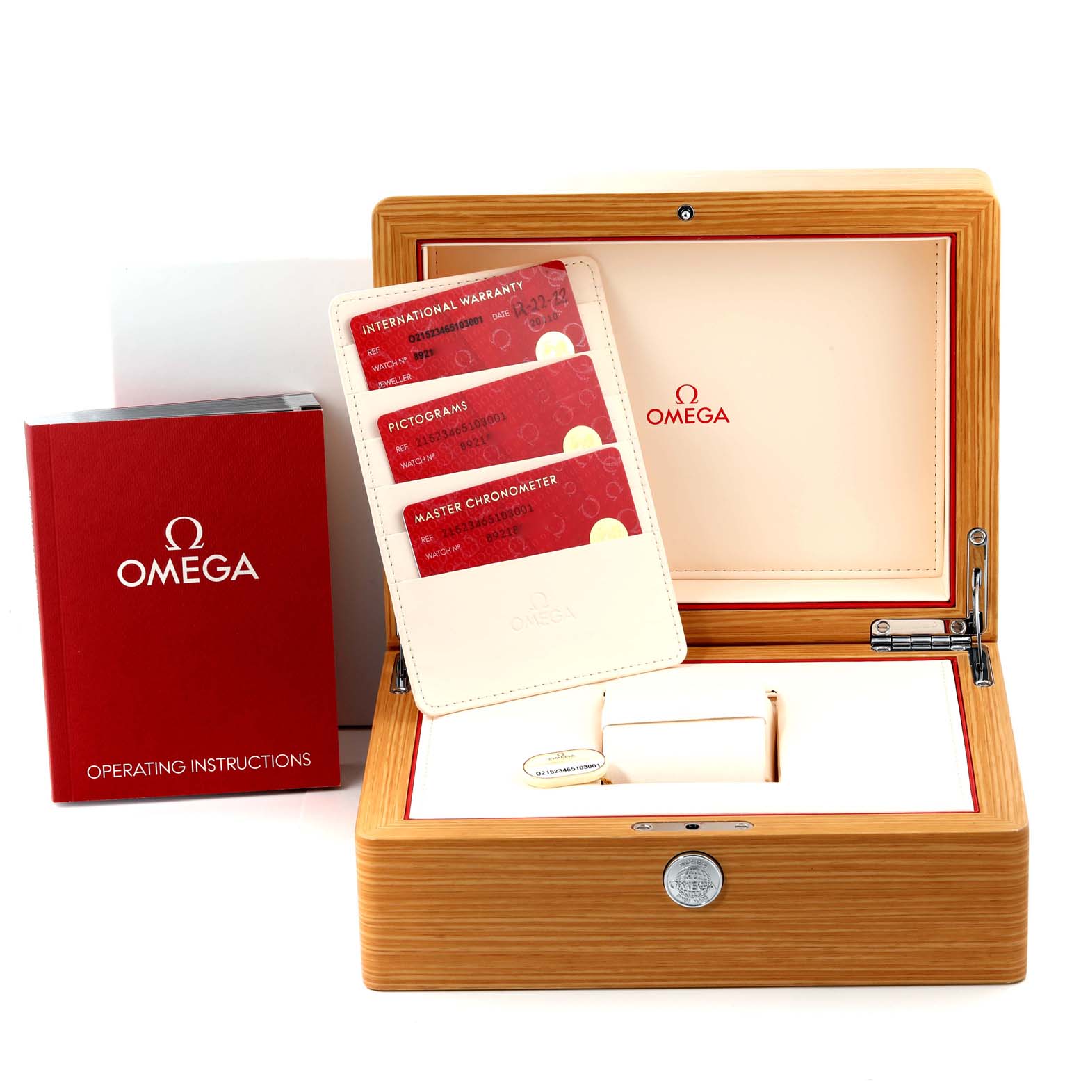 The image shows the accessories of an Omega Planet Ocean 215.23.46.51.03.001 Men's Steel and Gold (two tone) Blue Dial 215.23.46.51.03.001 Men's Steel and Gold (two tone) Blue Dial watch: a box, instruction manual, and warranty and certification cards.