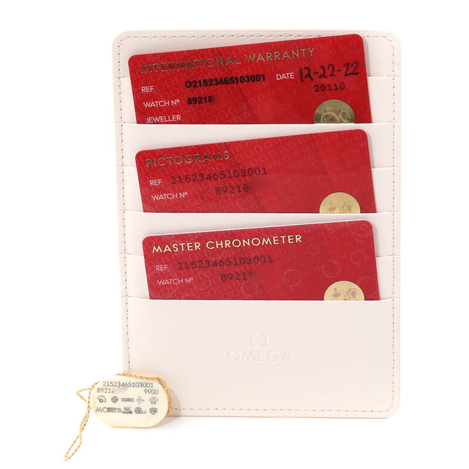 The image shows warranty cards and a tag for an Omega Planet Ocean 215.23.46.51.03.001 Men's Steel and Gold (two tone) Blue Dial 215.23.46.51.03.001 Men's Steel and Gold (two tone) Blue Dial watch, viewed from the front.