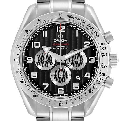 The Omega Speedmaster watch is shown from the front, highlighting the dial, hands, subdials, crown, and tachymeter bezel.