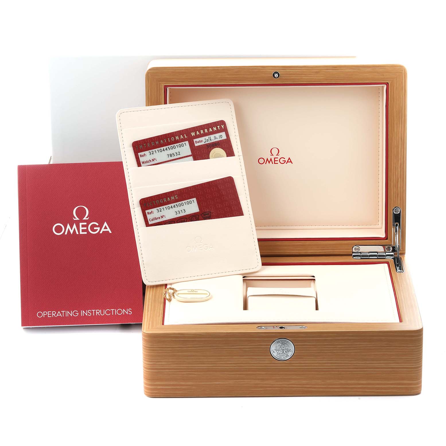 The Omega Speedmaster 321.10.44.50.01.001 Men
s Stainless Steel Black Dial 321.10.44.50.01.001 Men
s Stainless Steel Black Dial
s packaging is shown with the box, warranty cards, and instruction manual.