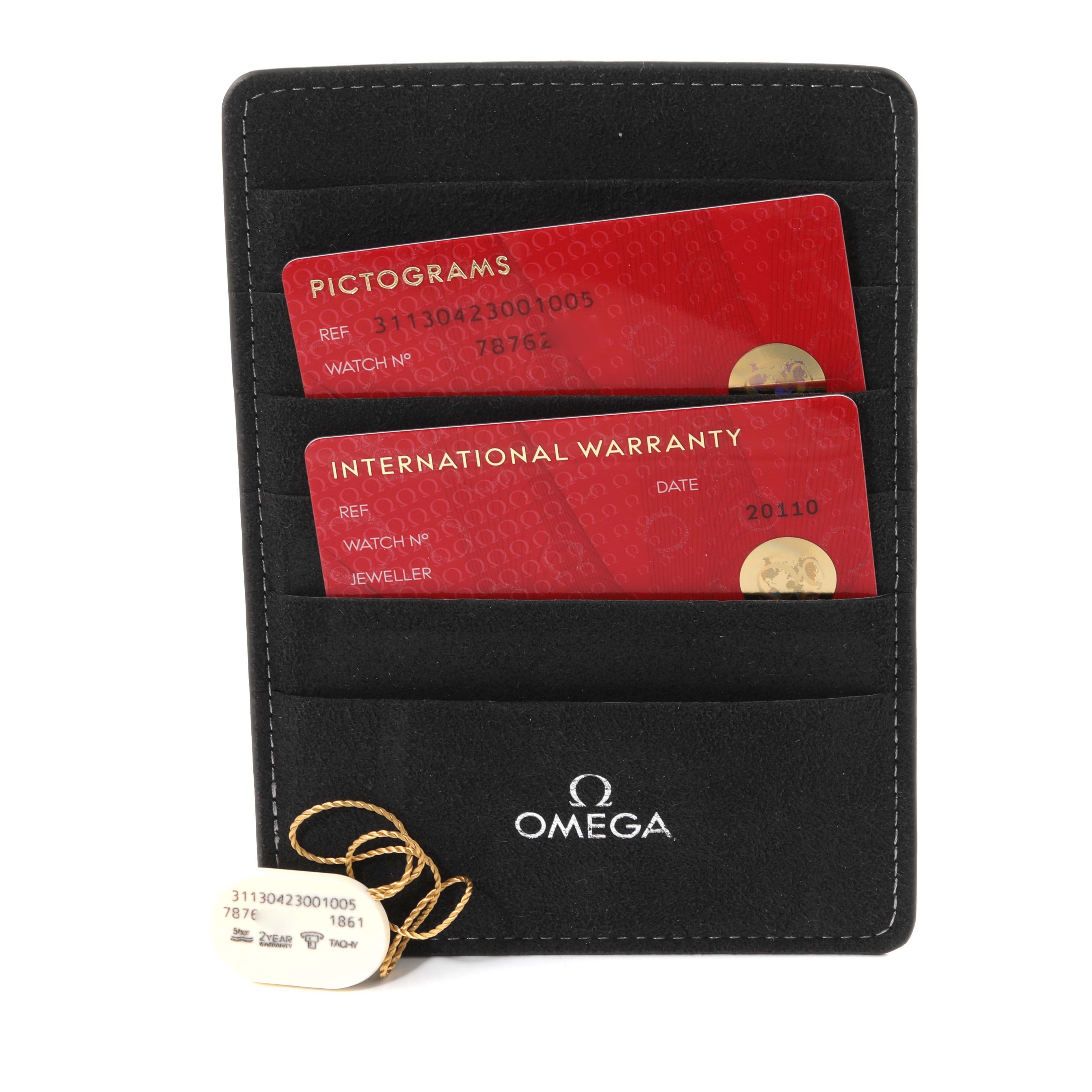 The image shows Omega Speedmaster 311.30.42.30.01.005 Men
s Stainless Steel Black Dial 311.30.42.30.01.005 Men
s Stainless Steel Black Dial model warranty and pictogram cards in a black Omega cardholder.