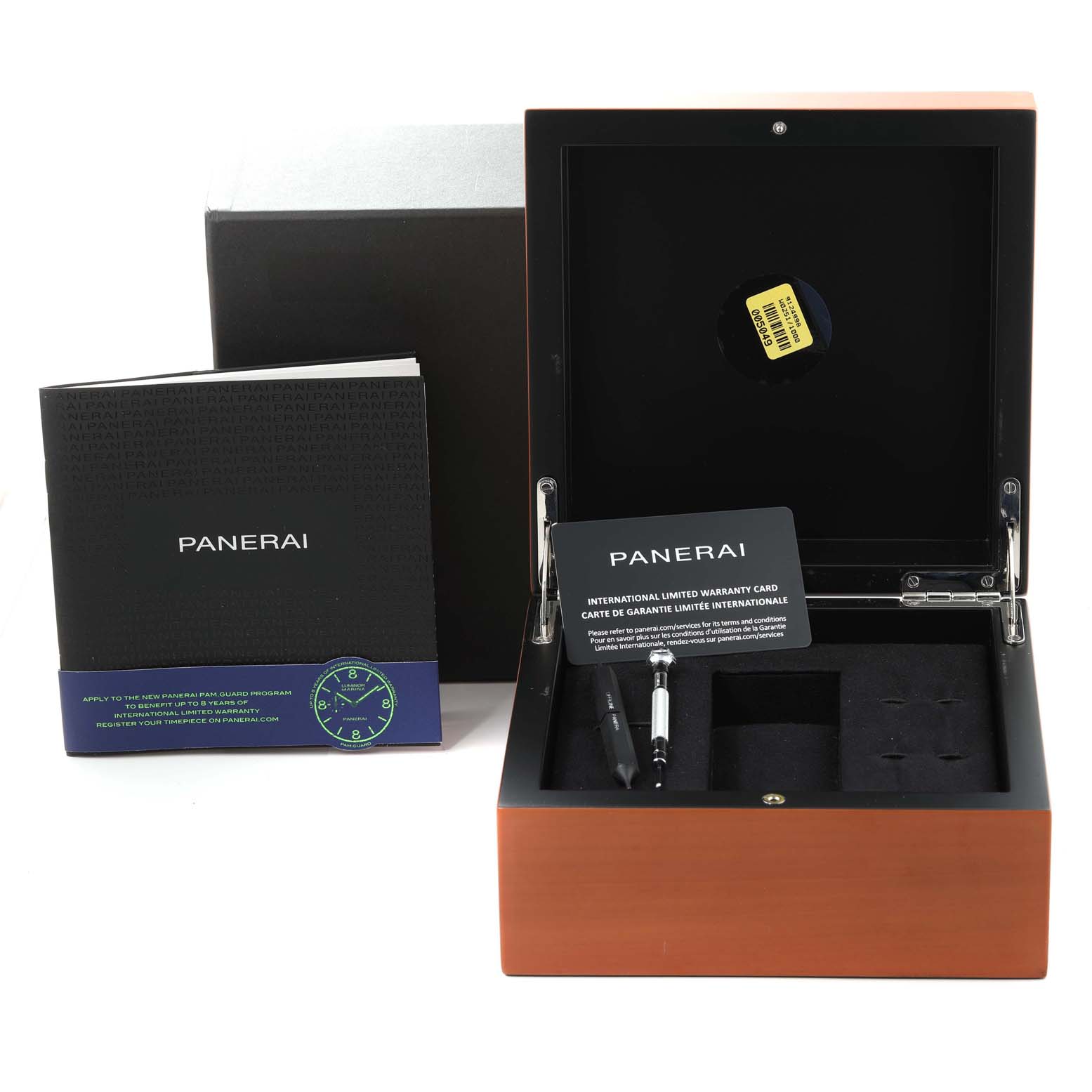 The image shows the box and accessories for a Panerai Luminor PAM01033 Men's Stainless Steel Blue Dial PAM01033 Men's Stainless Steel Blue Dial watch, including the warranty card and manuals.