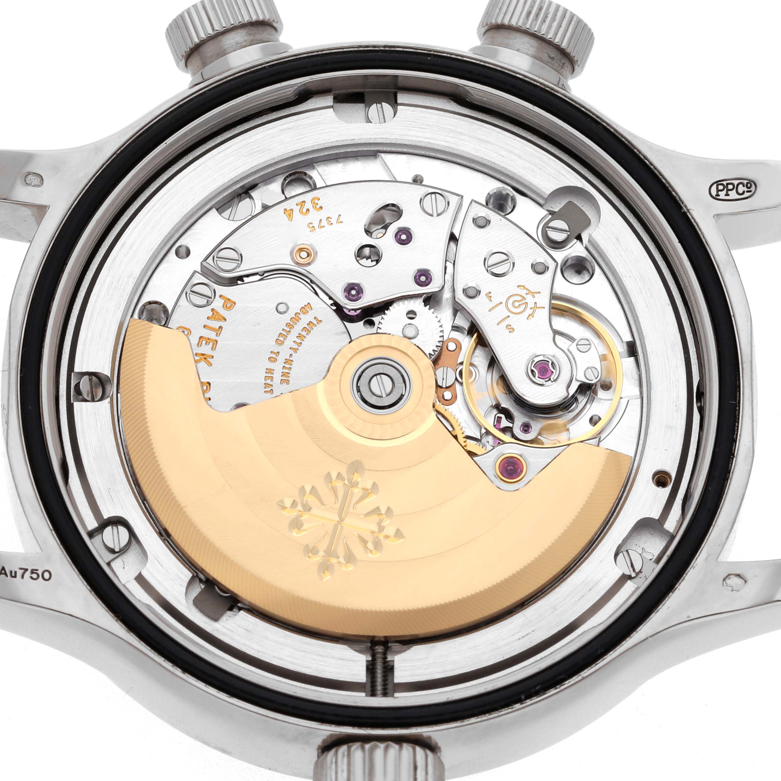 The image shows the back view of a Patek Philippe Calatrava 7234G-001 Men's White Gold Blue Dial 7234G-001 Men's White Gold Blue Dial, highlighting its intricate movement and rotor.