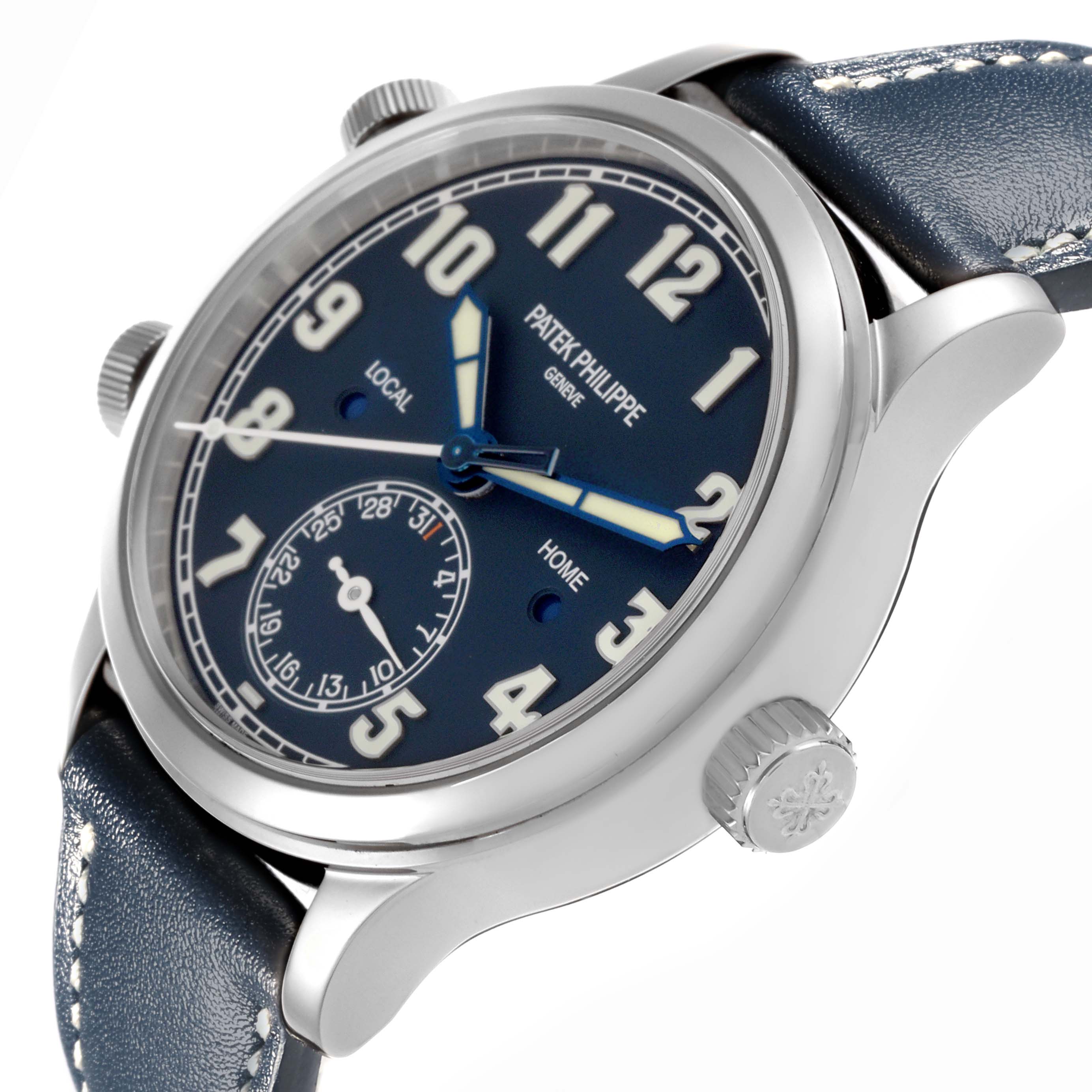 The Patek Philippe Calatrava 7234G-001 Men's White Gold Blue Dial 7234G-001 Men's White Gold Blue Dial watch is shown at an angle highlighting the blue dial, numerals, hands, crown, and part of the strap.