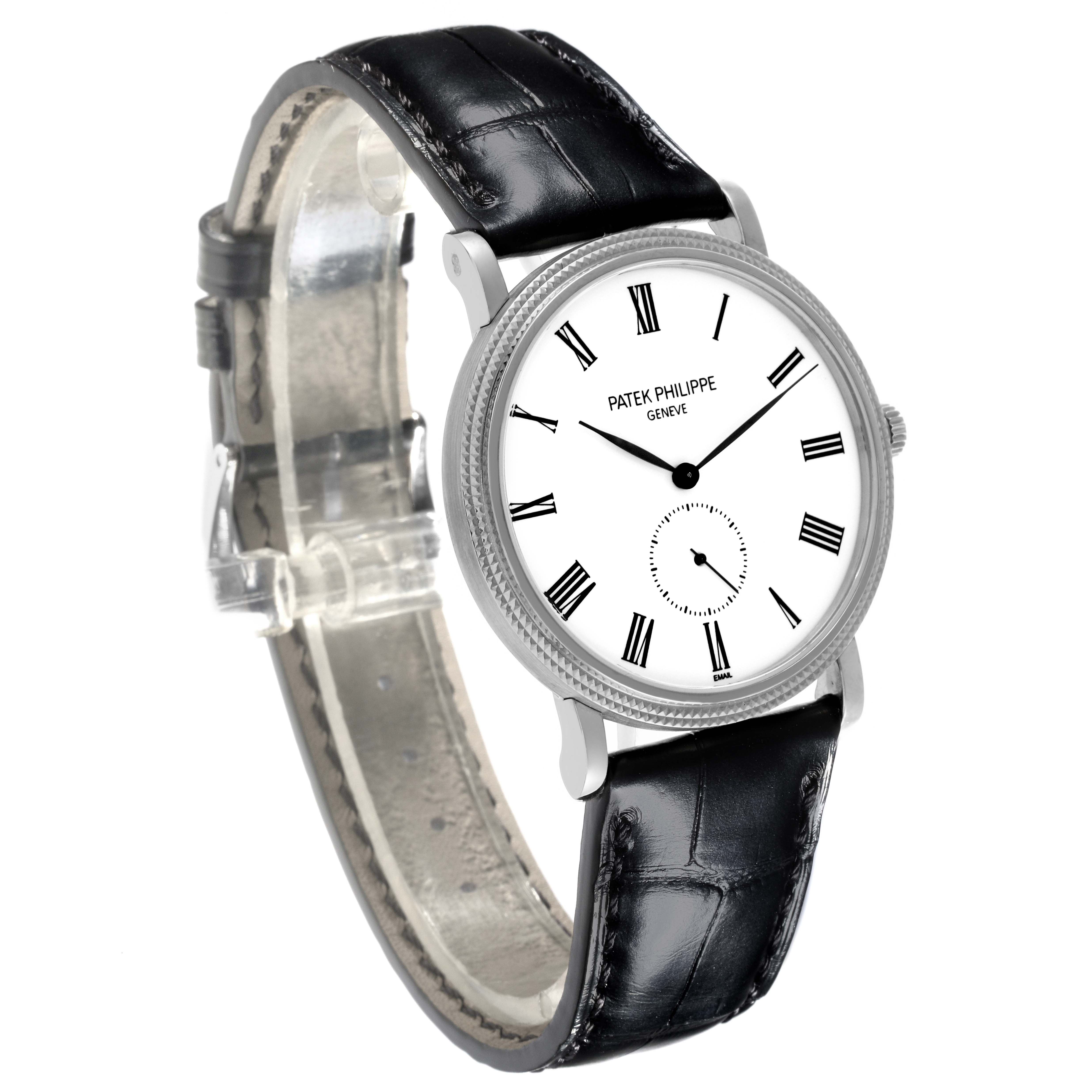 The Patek Philippe Calatrava 5116G-001 Men's White Gold White Dial 5116G-001 Men's White Gold White Dial watch is shown at a three-quarter angle, displaying the face, bezel, and leather strap.