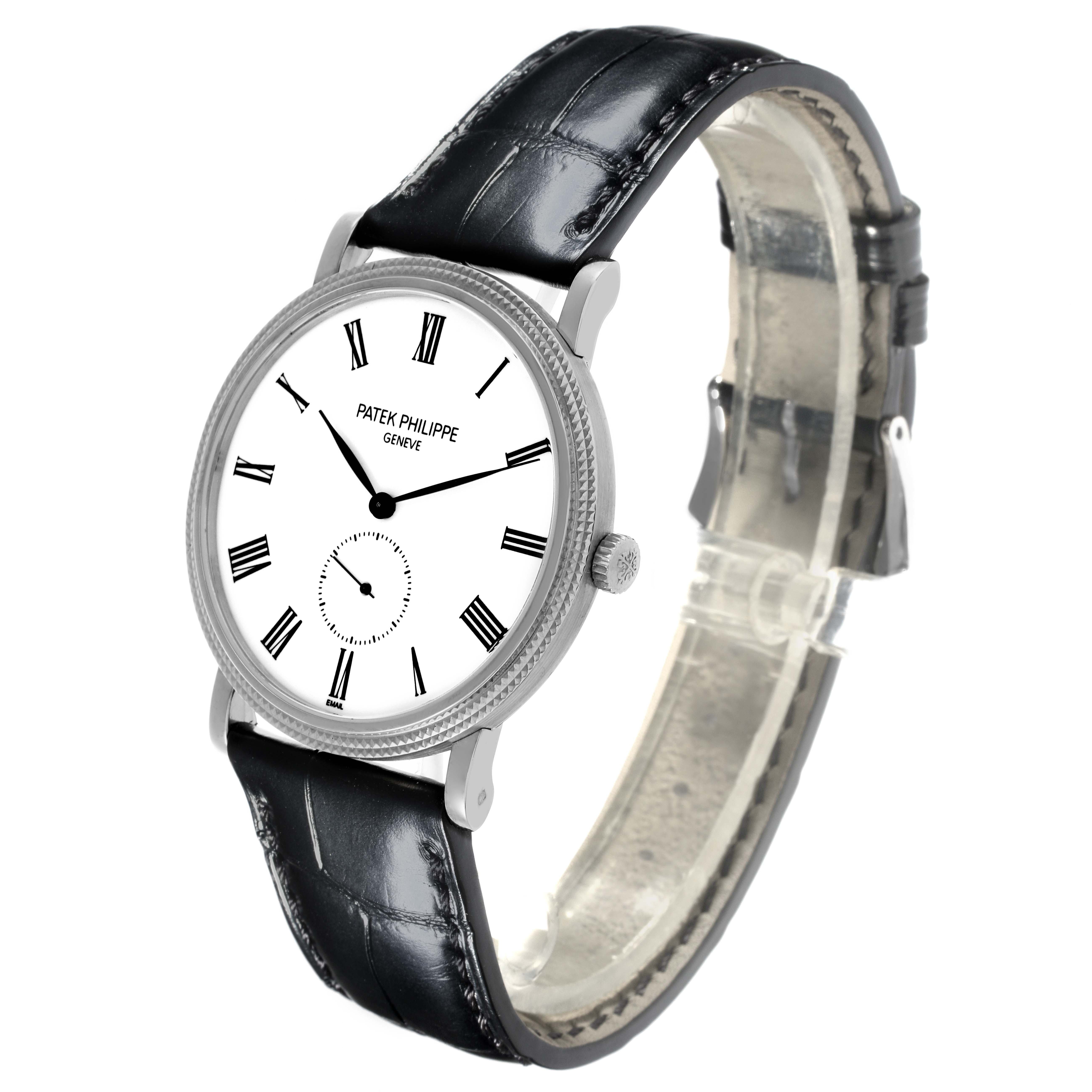 The Patek Philippe Calatrava 5116G-001 Men's White Gold White Dial 5116G-001 Men's White Gold White Dial watch is shown at a side angle, displaying the face, crown, and leather strap.