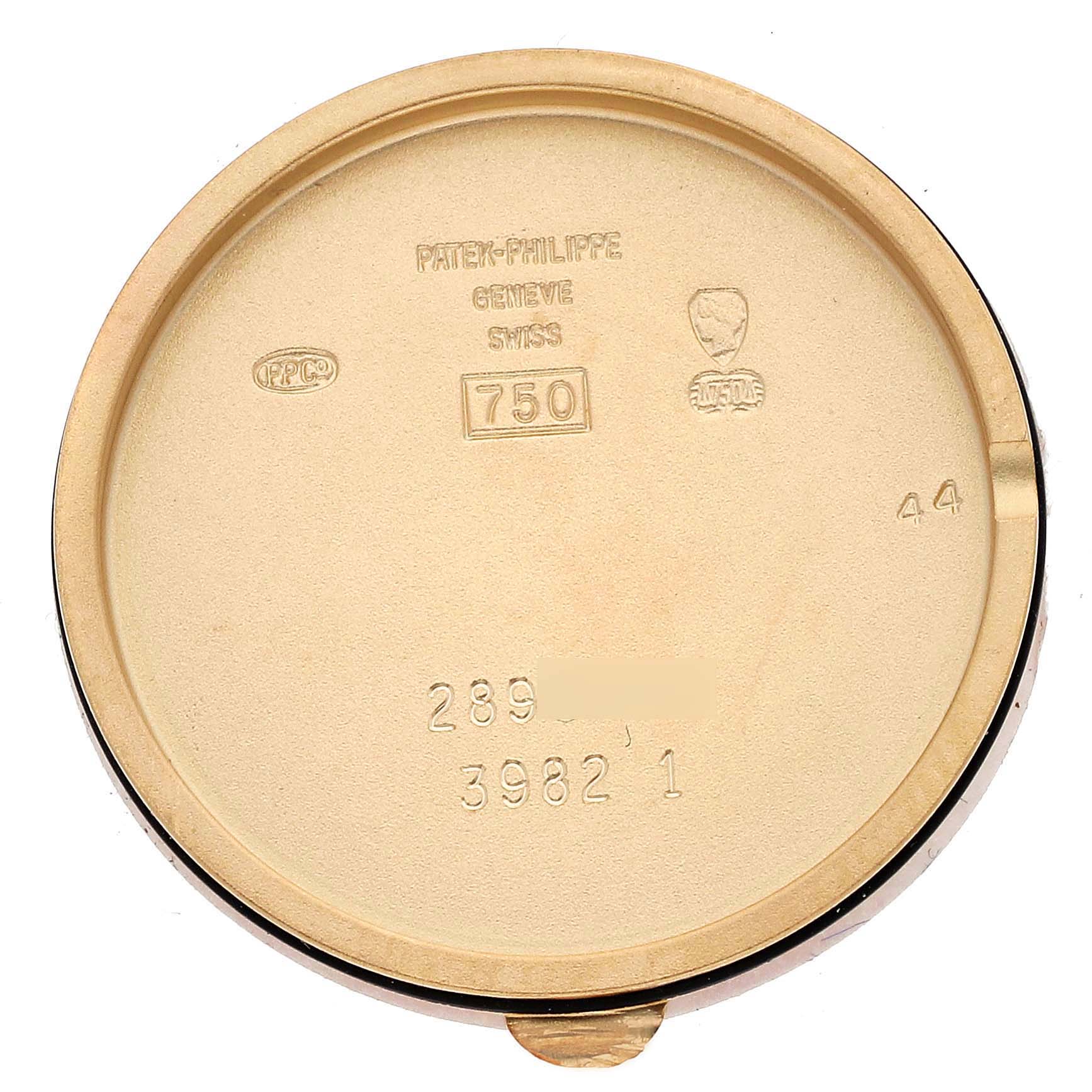 This image shows the inside case back of a Patek Philippe Calatrava 3982/1J Women's Yellow Gold Champagne Dial 3982/1J Women's Yellow Gold Champagne Dial watch, highlighting engraving details and hallmarks.