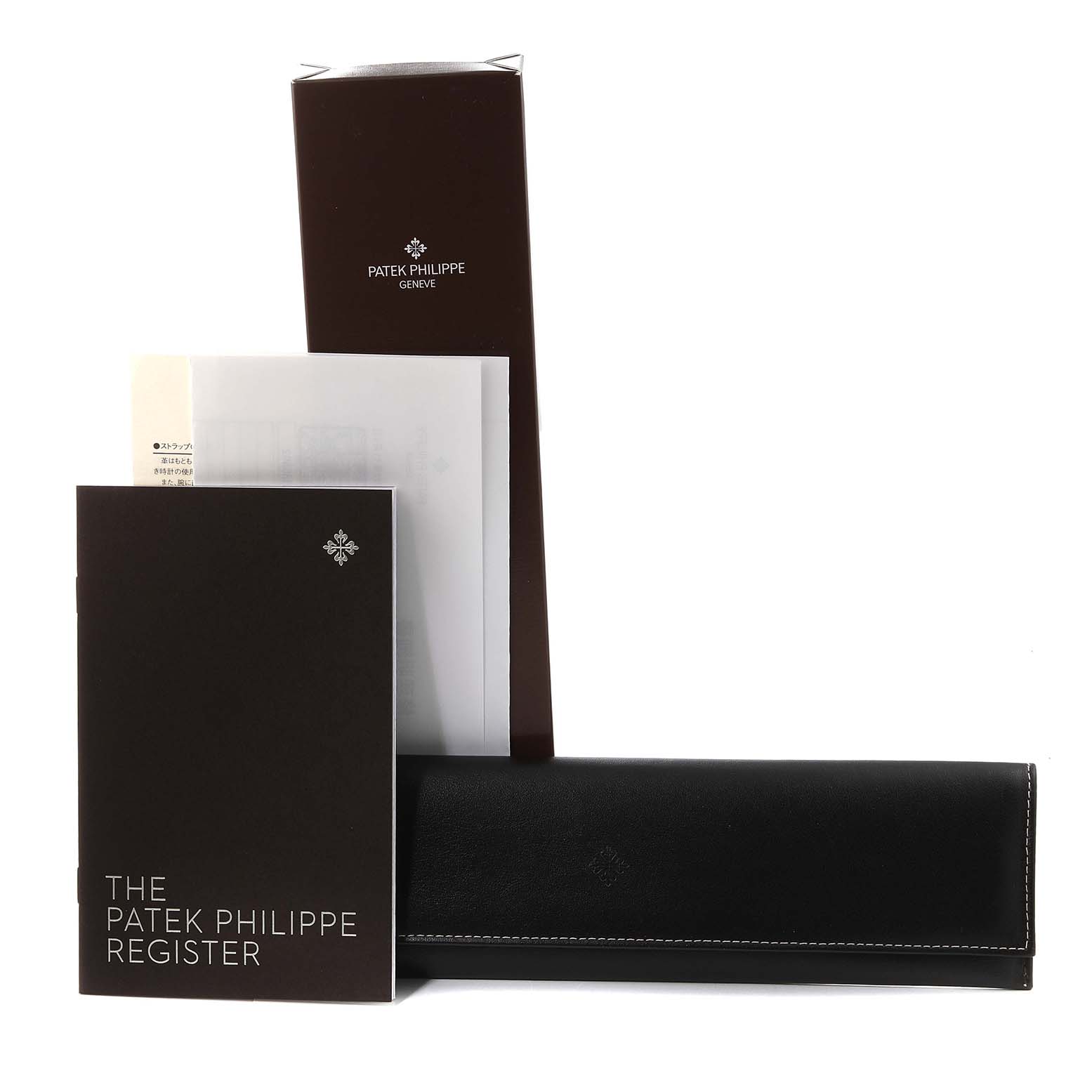 The image shows Patek Philippe Calatrava 3982/1J Women's Yellow Gold Champagne Dial 3982/1J Women's Yellow Gold Champagne Dial packaging, including a box, a leather watch case, and manuals.