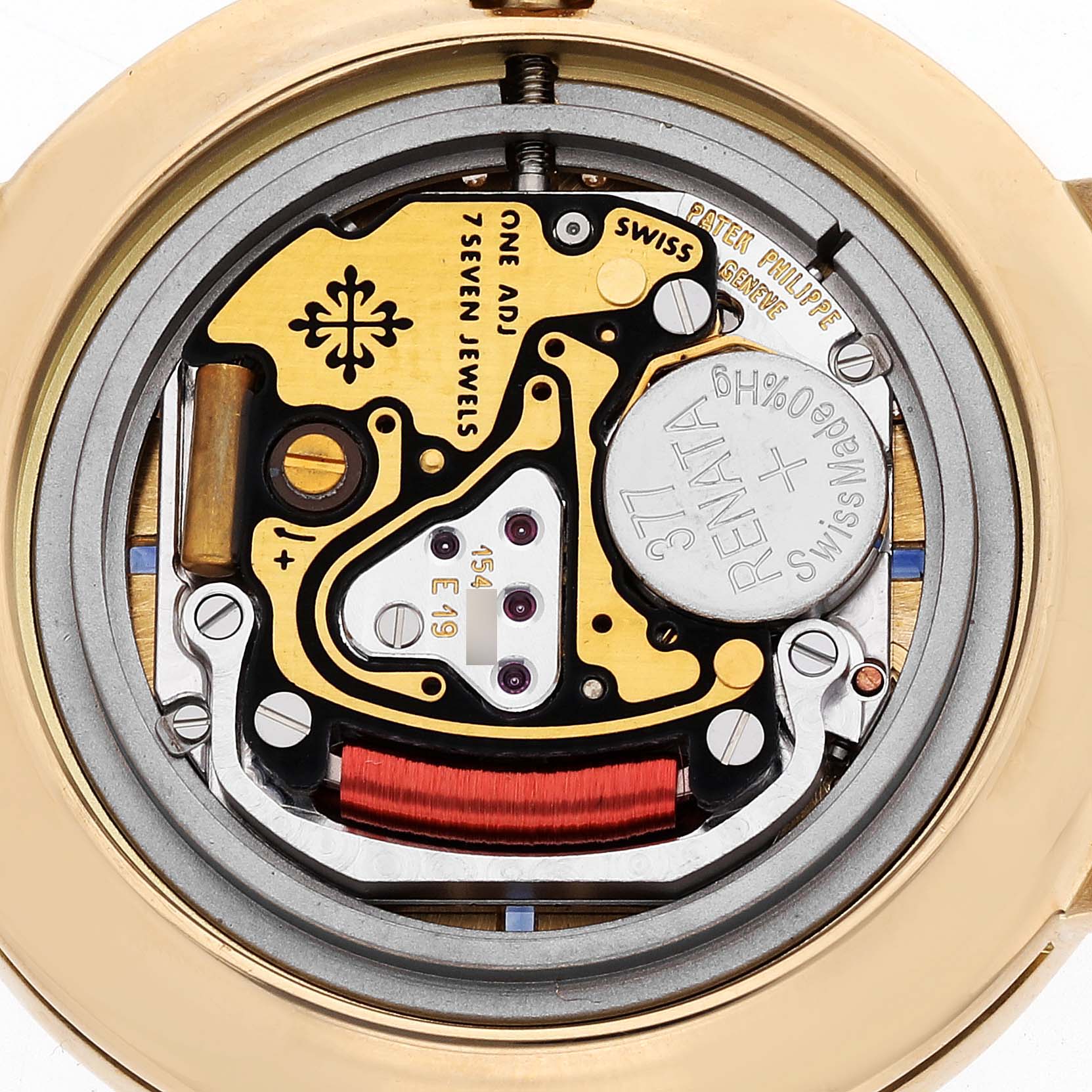 This is a close-up view of the movement in a Patek Philippe Calatrava 3982/1J Women's Yellow Gold Champagne Dial 3982/1J Women's Yellow Gold Champagne Dial watch, showing intricate internal components.