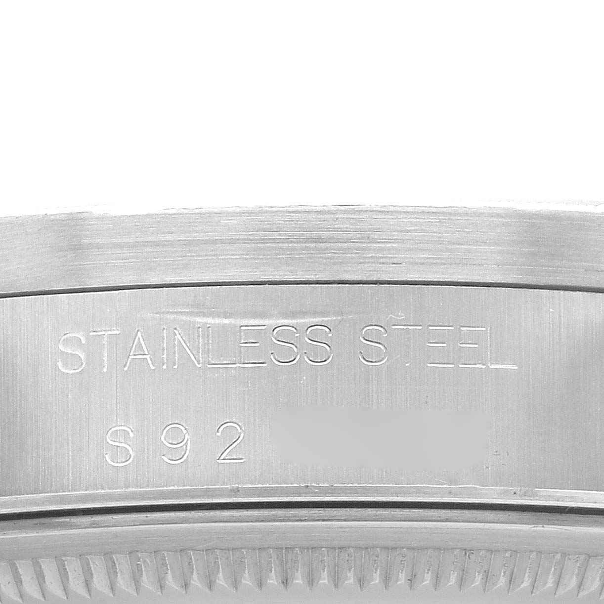 The image shows a close-up view of the stainless steel case back of a Rolex Air-King 14010 Men's Stainless Steel Black Dial 14010 Men's Stainless Steel Black Dial watch.