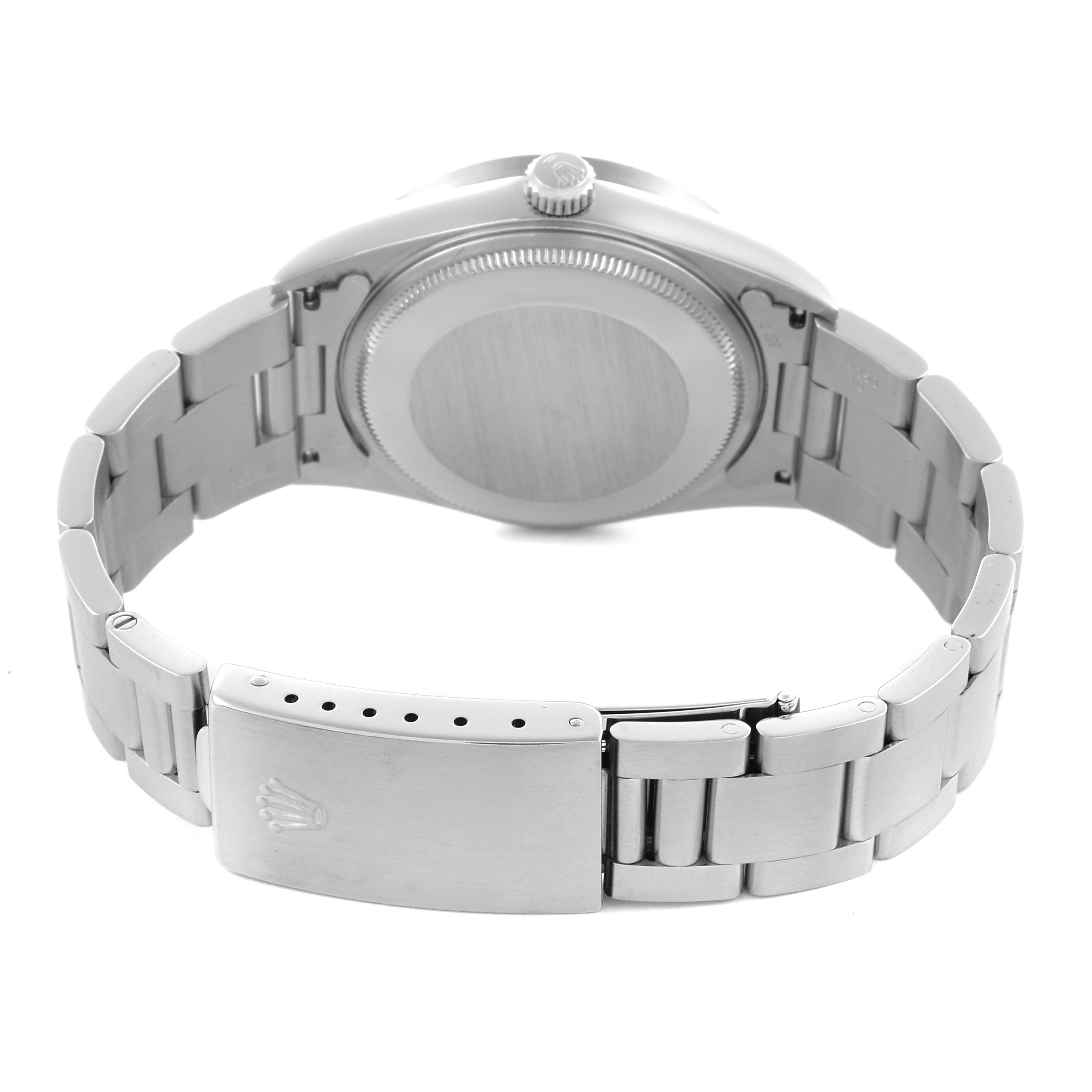 The Rolex Air-King 14010 Men's Stainless Steel Black Dial 14010 Men's Stainless Steel Black Dial watch is shown from the back, highlighting the case back, bracelet, and clasp.