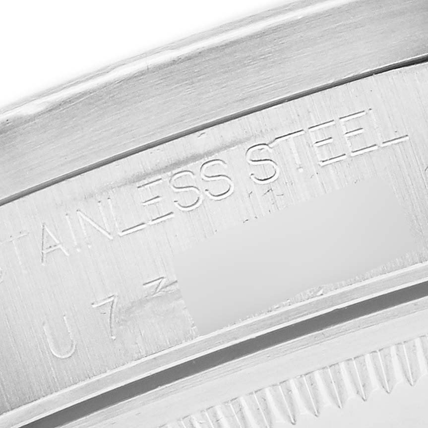 The image shows a close-up of the engraved stainless steel case back of the Rolex Air-King 14010 Men's Stainless Steel Silver Dial 14010 Men's Stainless Steel Silver Dial.