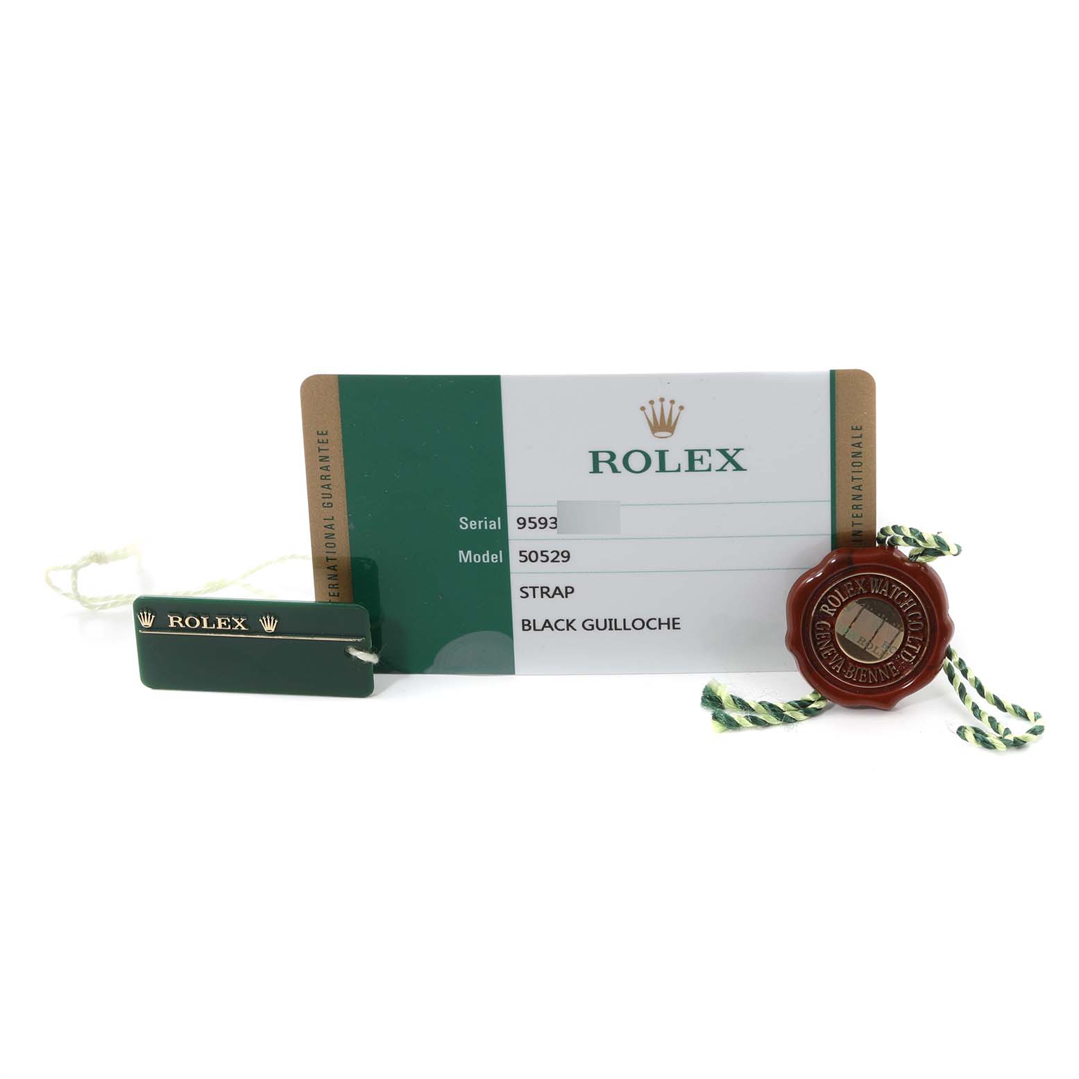 The image shows the serial and model card, a tag, and a seal for a Rolex Cellini 50529 Men's White Gold Black Dial 50529 Men's White Gold Black Dial model watch.