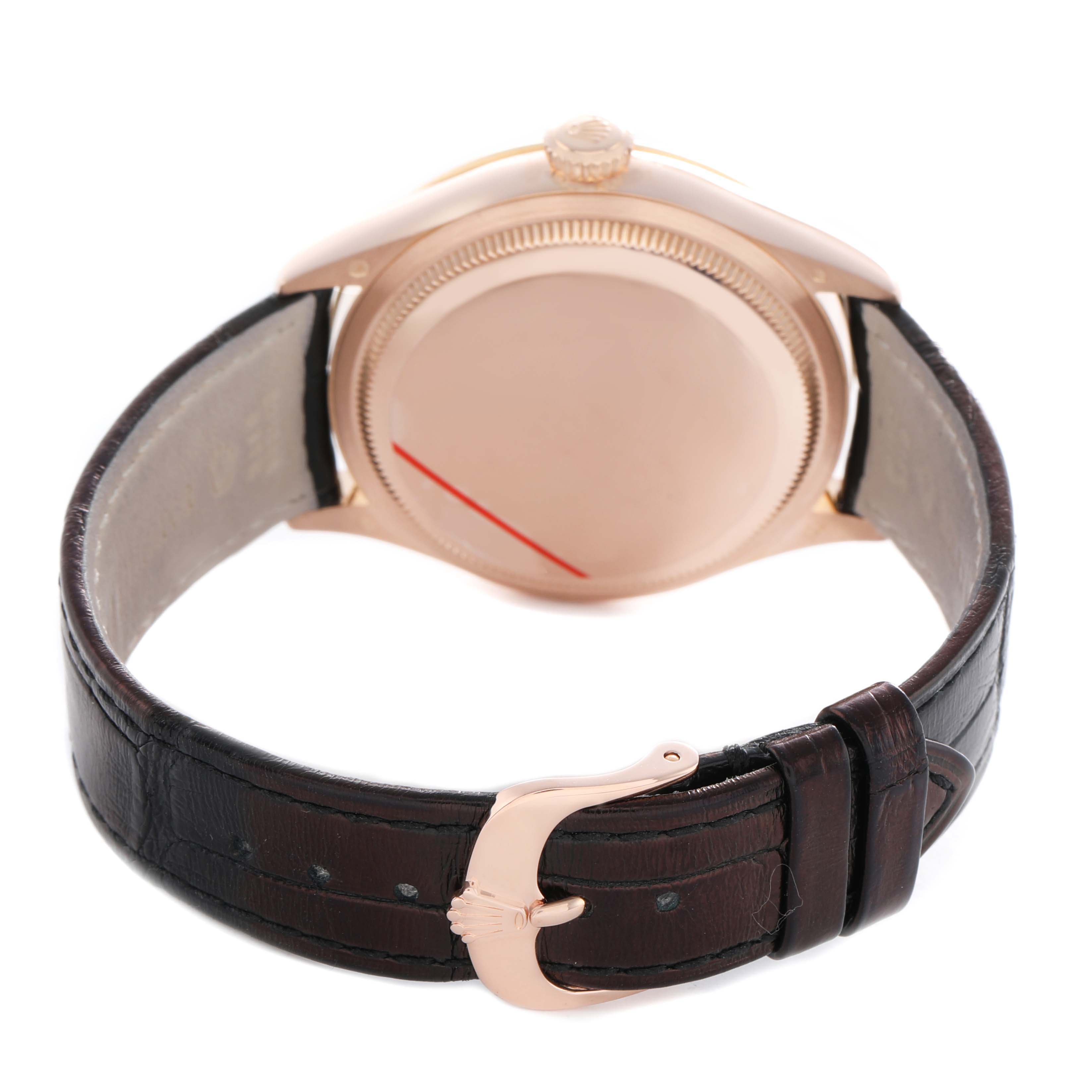 The image shows the back view of a Rolex Cellini 50705 Men's Rose Gold Black Dial watch, highlighting the case back, crown, and leather strap with a clasp.