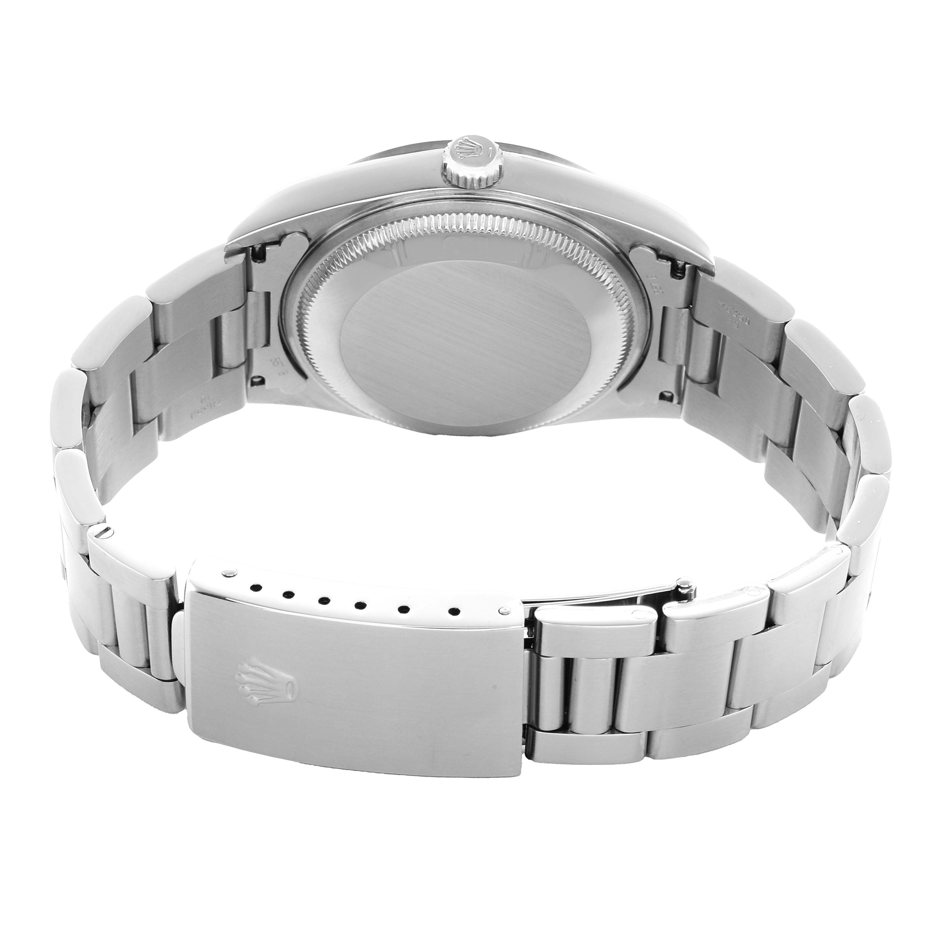 The image shows the back case and bracelet of a Rolex Date 15200 Men's Stainless Steel Black Dial watch with an open clasp.