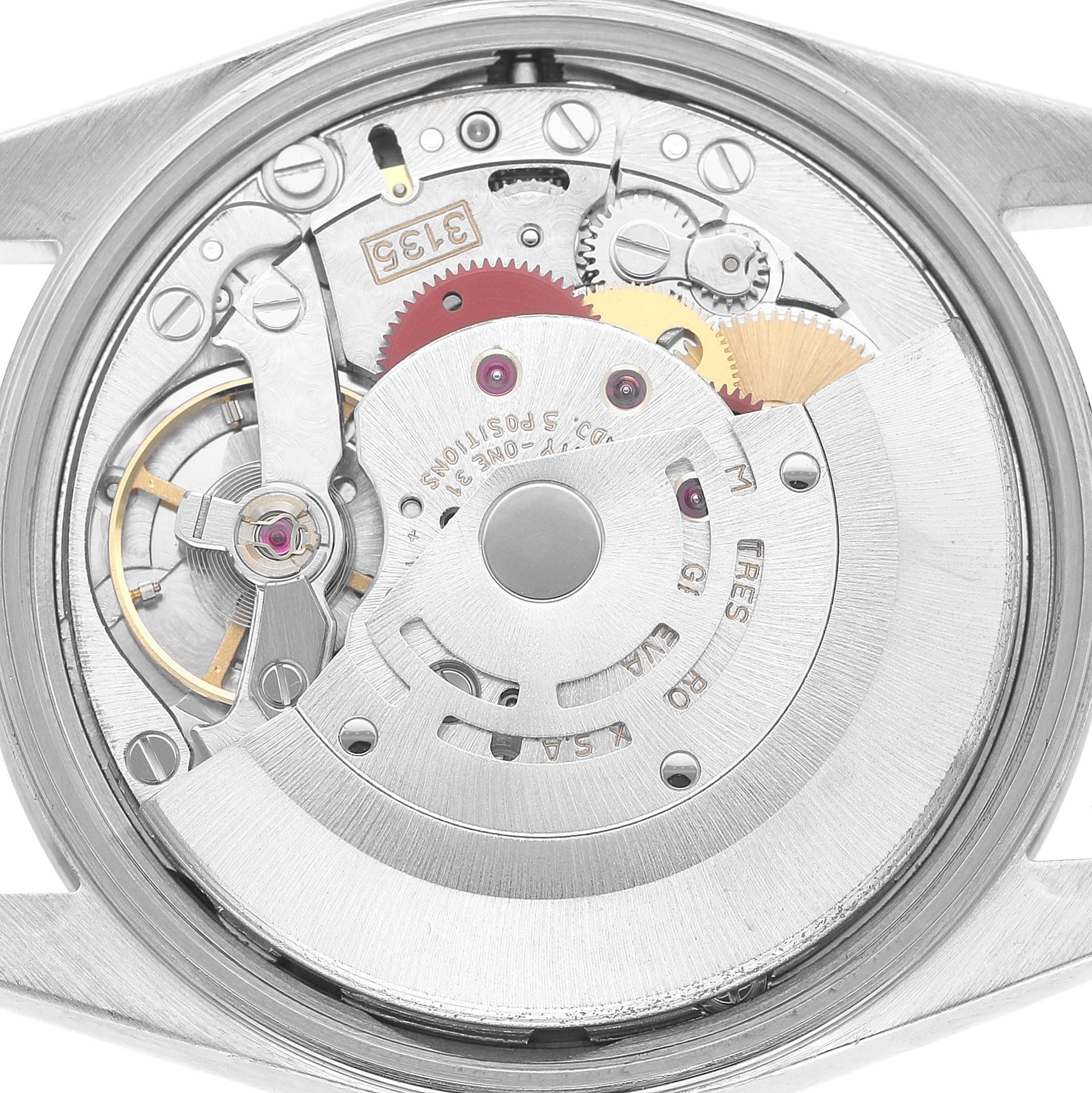 The image shows the movement mechanism of a Rolex Date 15200 Men's Stainless Steel Black Dial watch, viewed from the back.