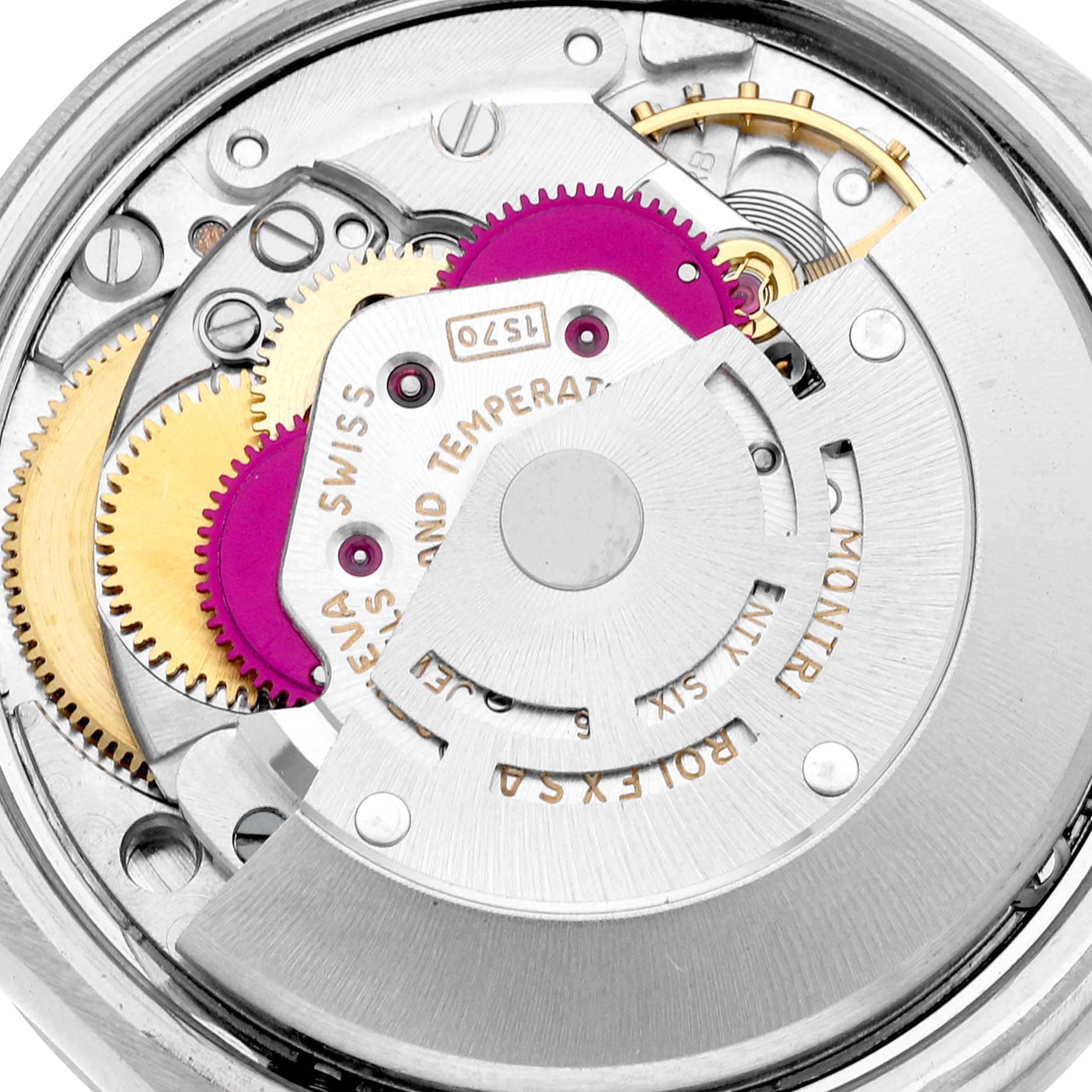 This image shows the inner mechanical movement of the Vintage Collection model by Rolex, focusing on gears and components.