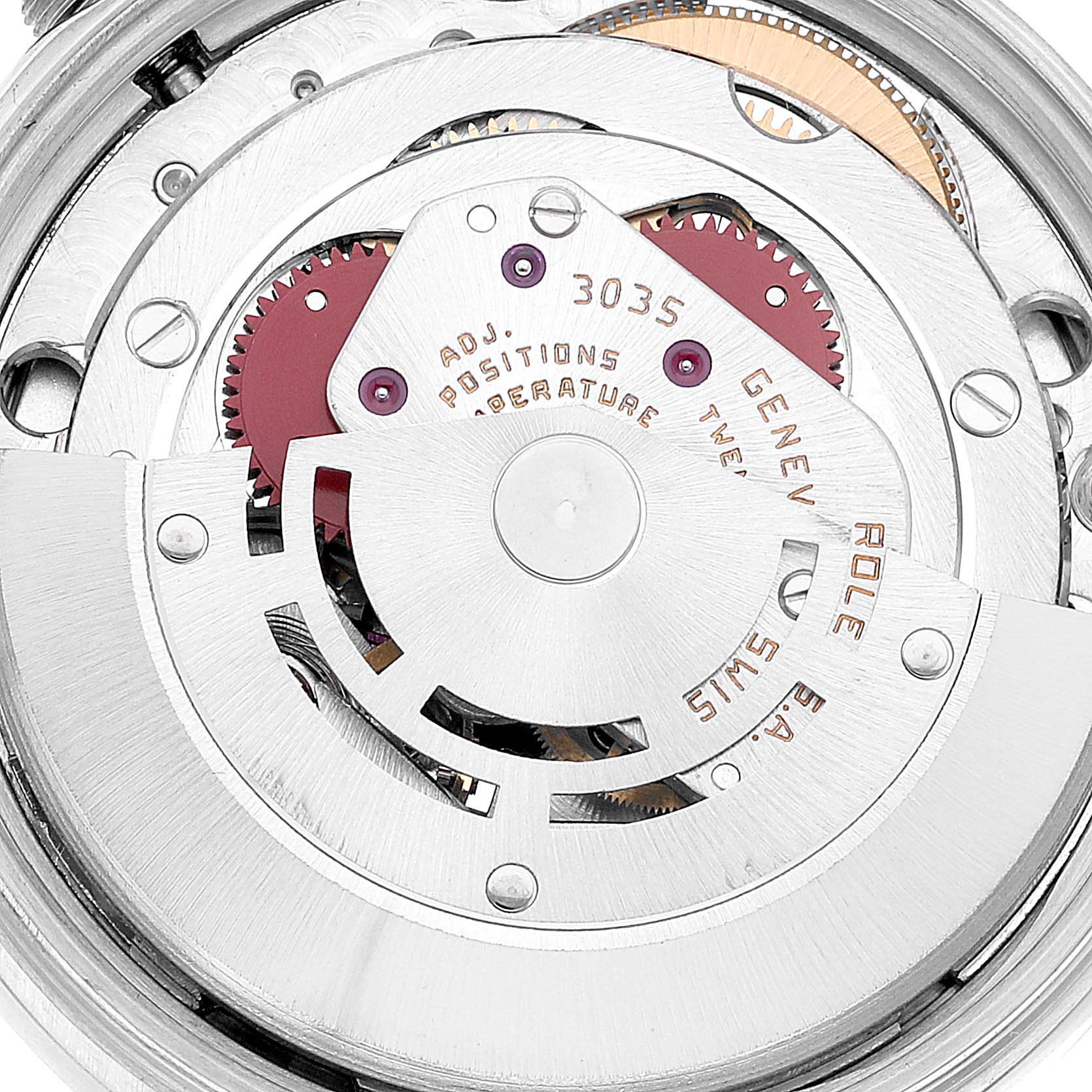 The image shows the inner mechanical movement of a Vintage Collection model by Rolex, viewed from the back.