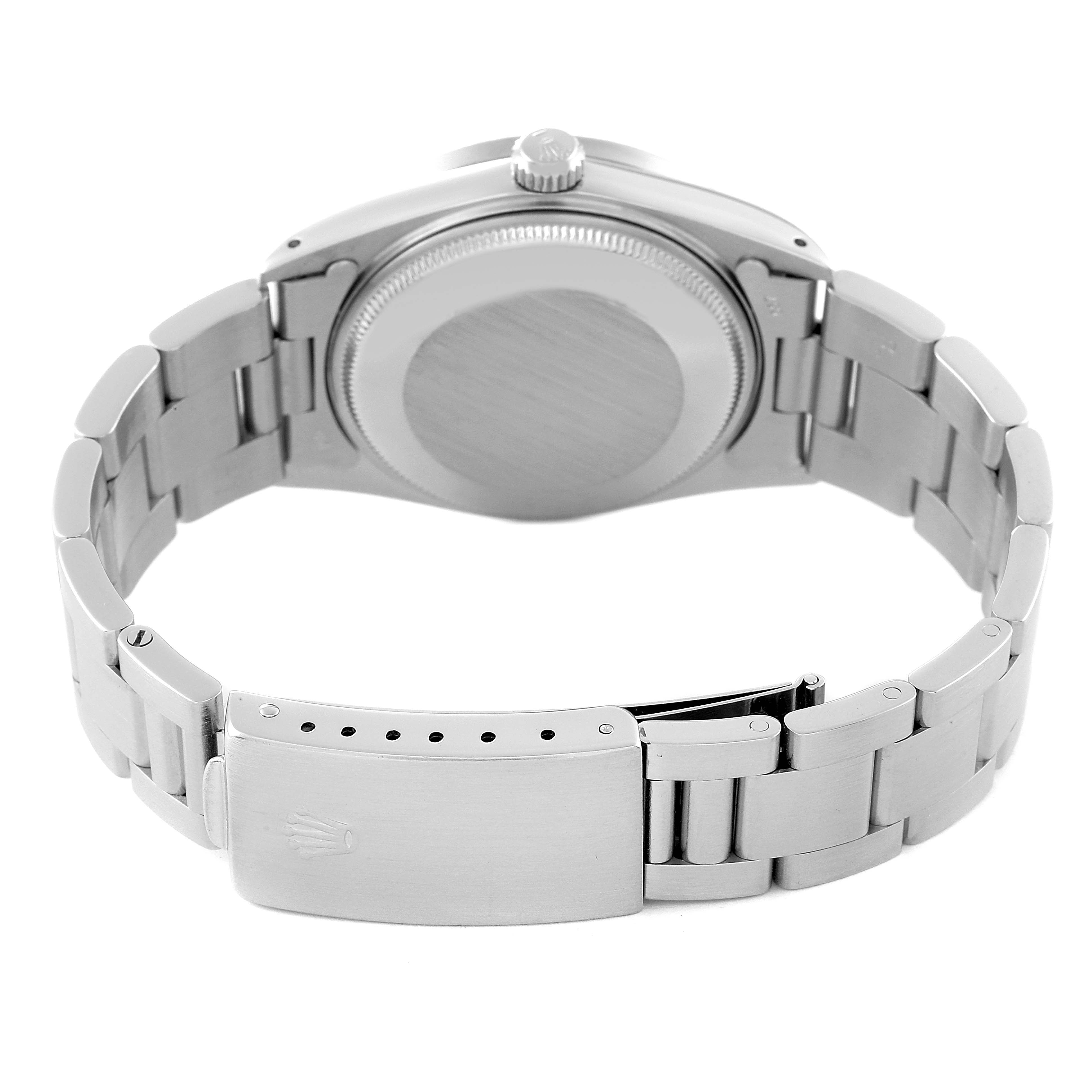 The image shows the back and bracelet of a Rolex Vintage Collection 15010 Men's Stainless Steel Silver Dial 15010 Men's Stainless Steel Silver Dial model watch, highlighting its clasp and case back.