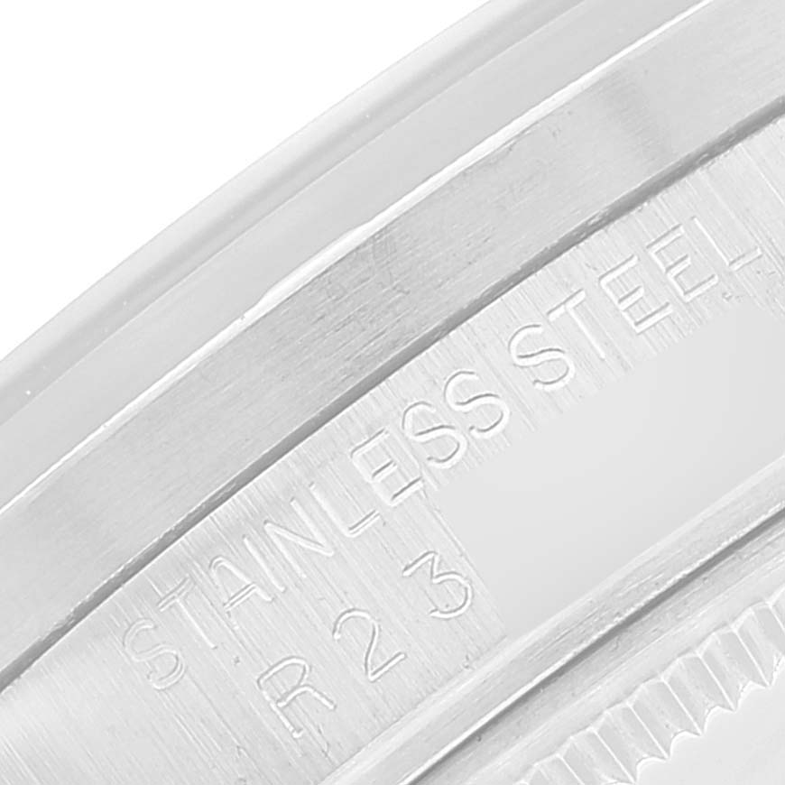 This close-up shows the engraving on the stainless steel case back of a Rolex Vintage Collection 15010 Men's Stainless Steel Silver Dial 15010 Men's Stainless Steel Silver Dial watch.