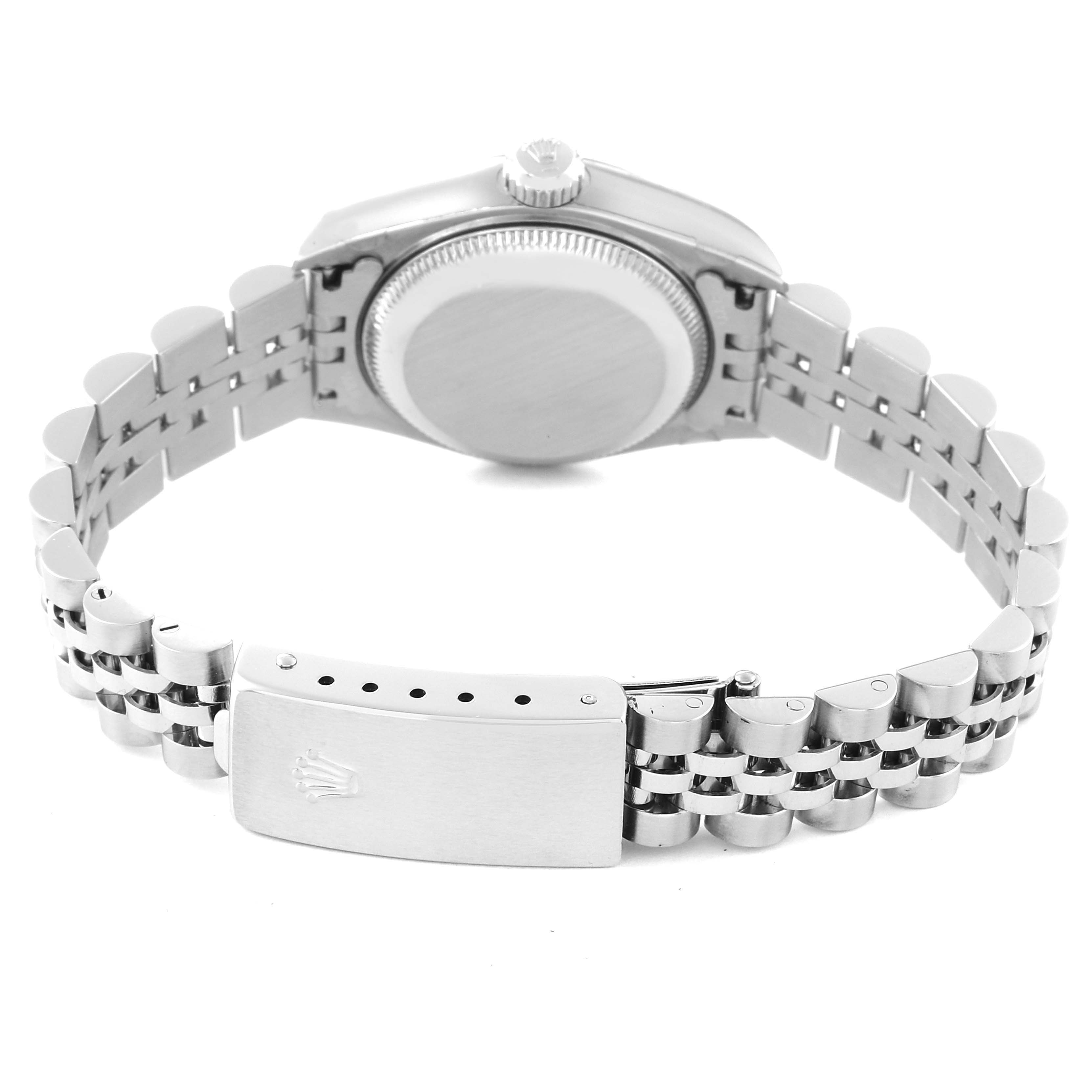 This image shows the back and clasp of a Rolex Datejust 79174 Women's Stainless Steel Black Dial 79174 Women's Stainless Steel Black Dial watch, highlighting its bracelet and crown.