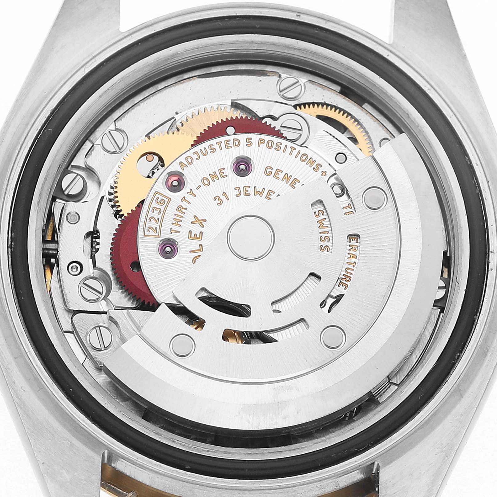 The image shows the movement of a Rolex Datejust 279173 Women's Steel and Gold (two tone) Champagne Dial watch from a top-down angle, revealing its intricate internal components.