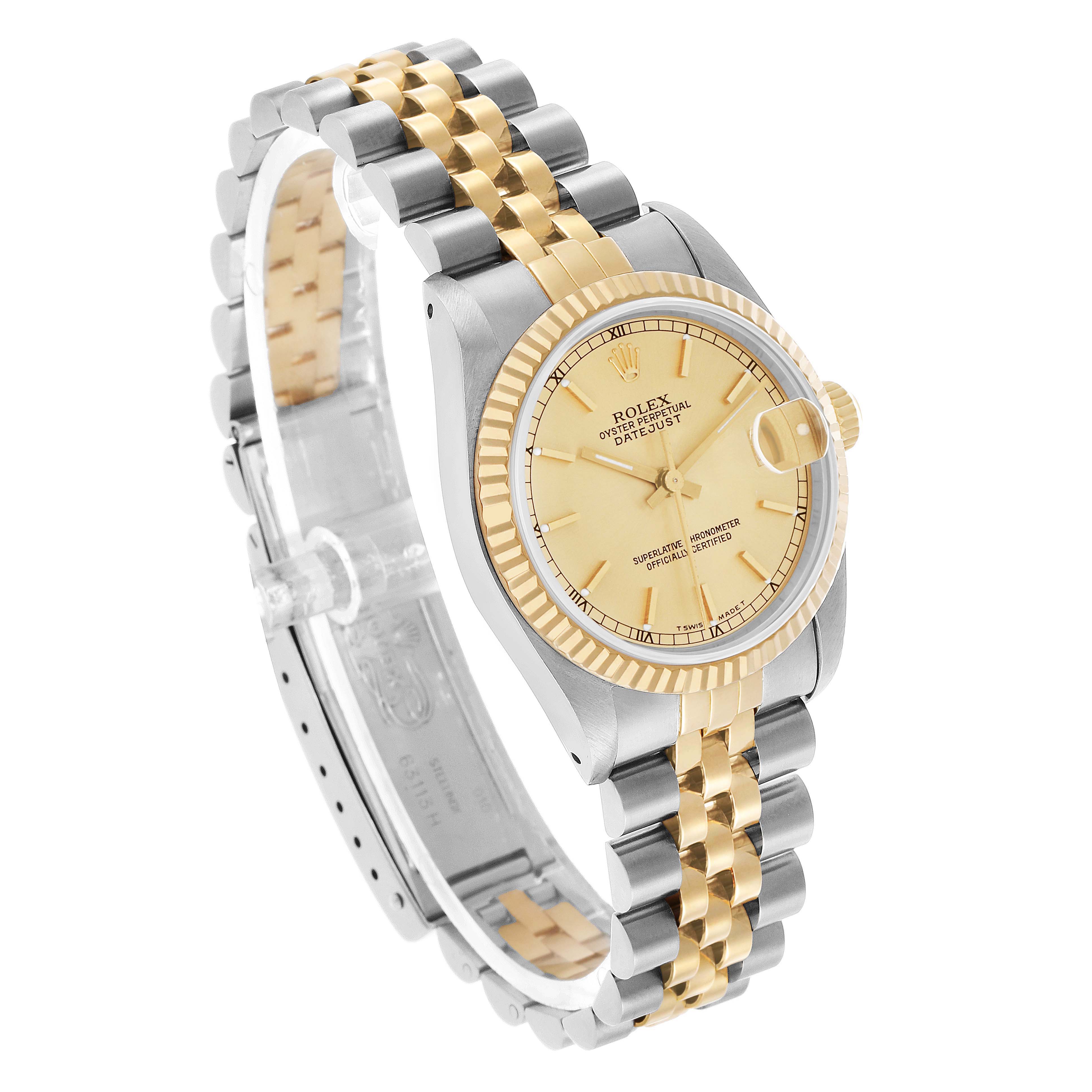 The Rolex Datejust 68273 Women's Stainless Steel Champagne Dial watch is shown at a three-quarter angle, highlighting the dial, bezel, and two-tone jubilee bracelet.