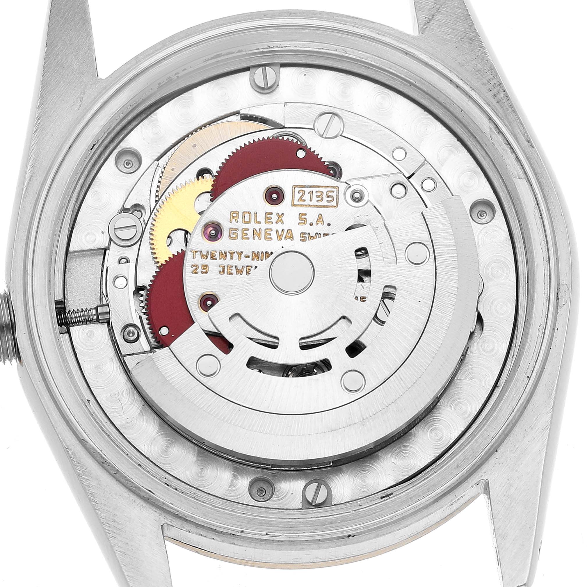 The image shows the back view of a Rolex Datejust 68273 Women's Stainless Steel Champagne Dial watch, revealing its movement and inner mechanics.