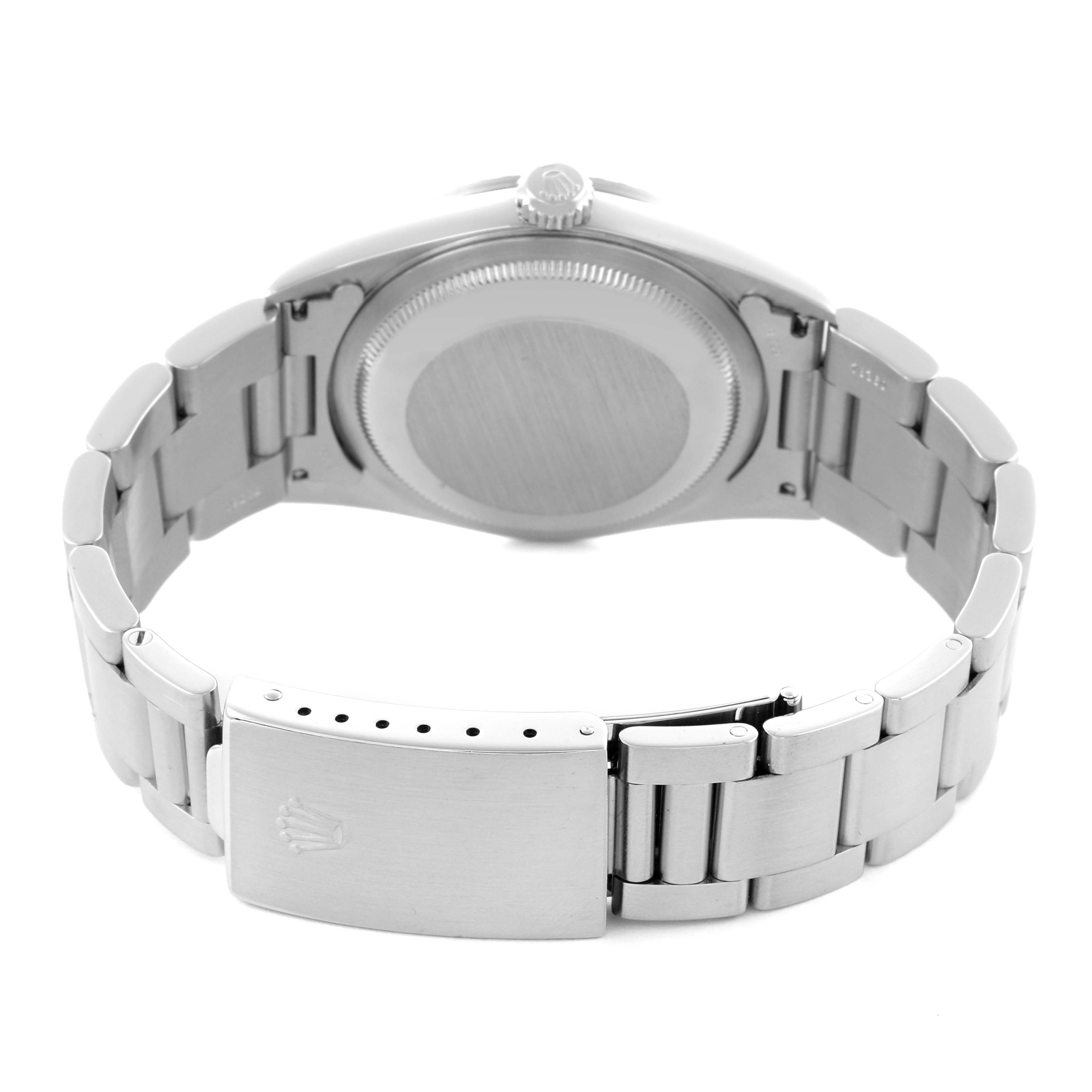 The image shows the back case and bracelet of a Rolex Datejust 16220 Men's Stainless Steel Blue Dial 16220 Men's Stainless Steel Blue Dial watch from a rear angle.