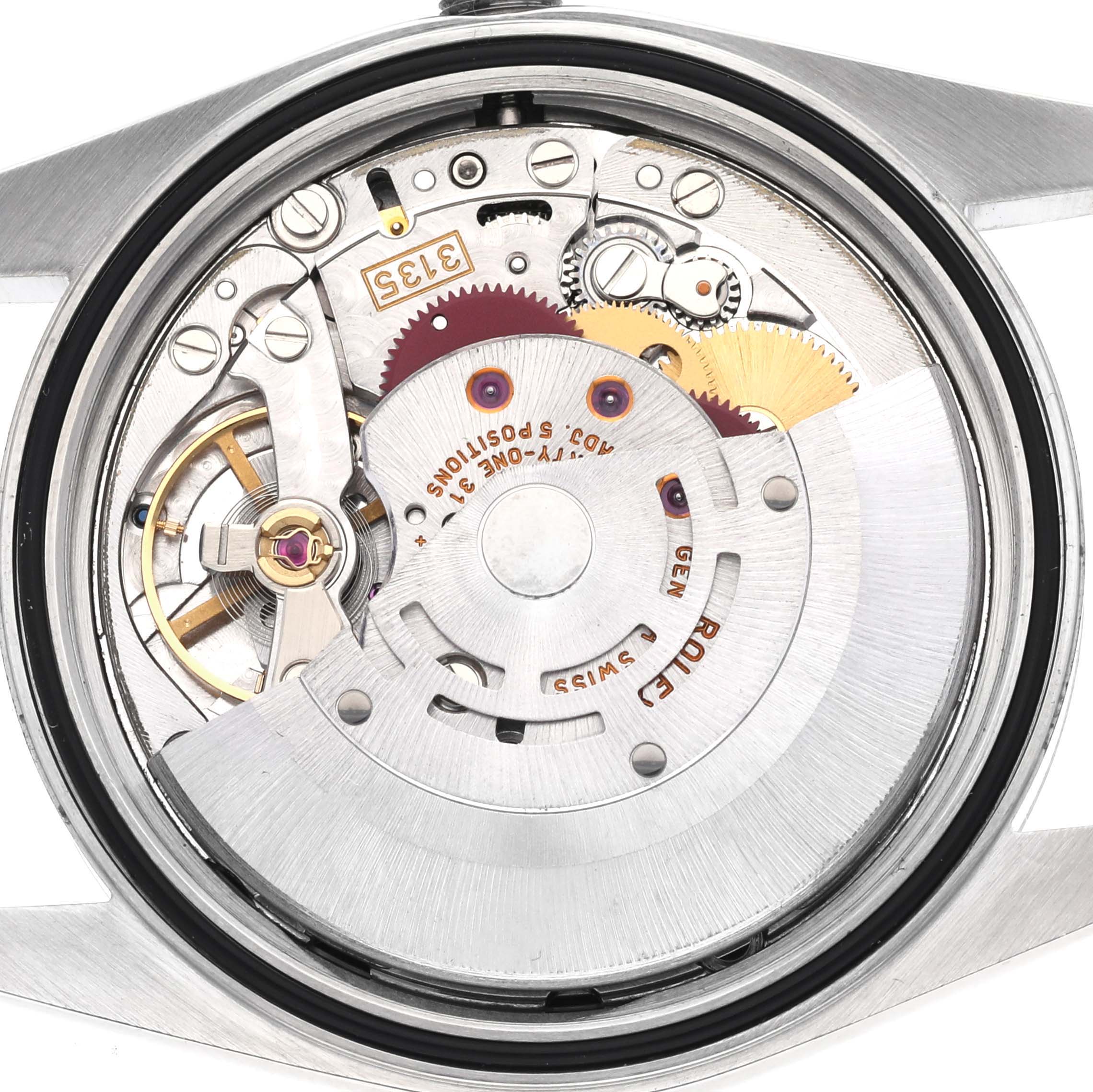 The image shows the intricate inner workings and movement parts of a Rolex Datejust 16200 Men
s Stainless Steel Black Dial 16200 Men
s Stainless Steel Black Dial watch from a back view.