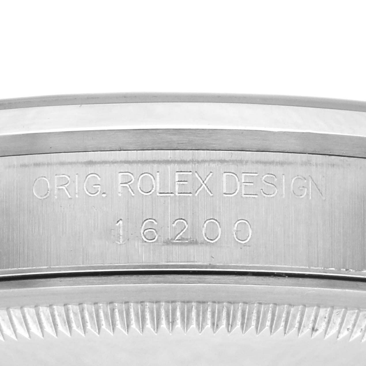 The image shows a close-up side view of the Rolex Datejust 16200 Men
s Stainless Steel Black Dial 16200 Men
s Stainless Steel Black Dial
s bezel and case, featuring the model number and design engraving.