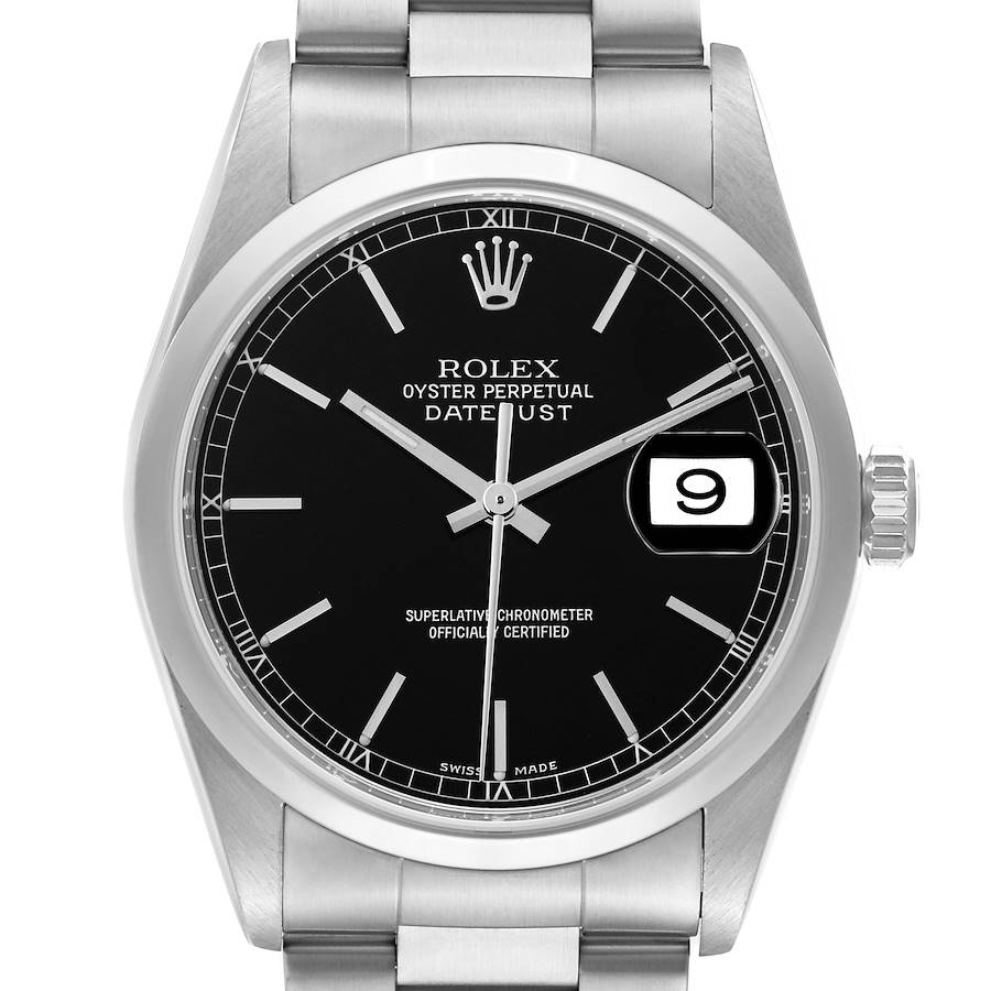 The Rolex Datejust watch is shown from the front, highlighting the black dial, date window, and stainless steel bracelet.